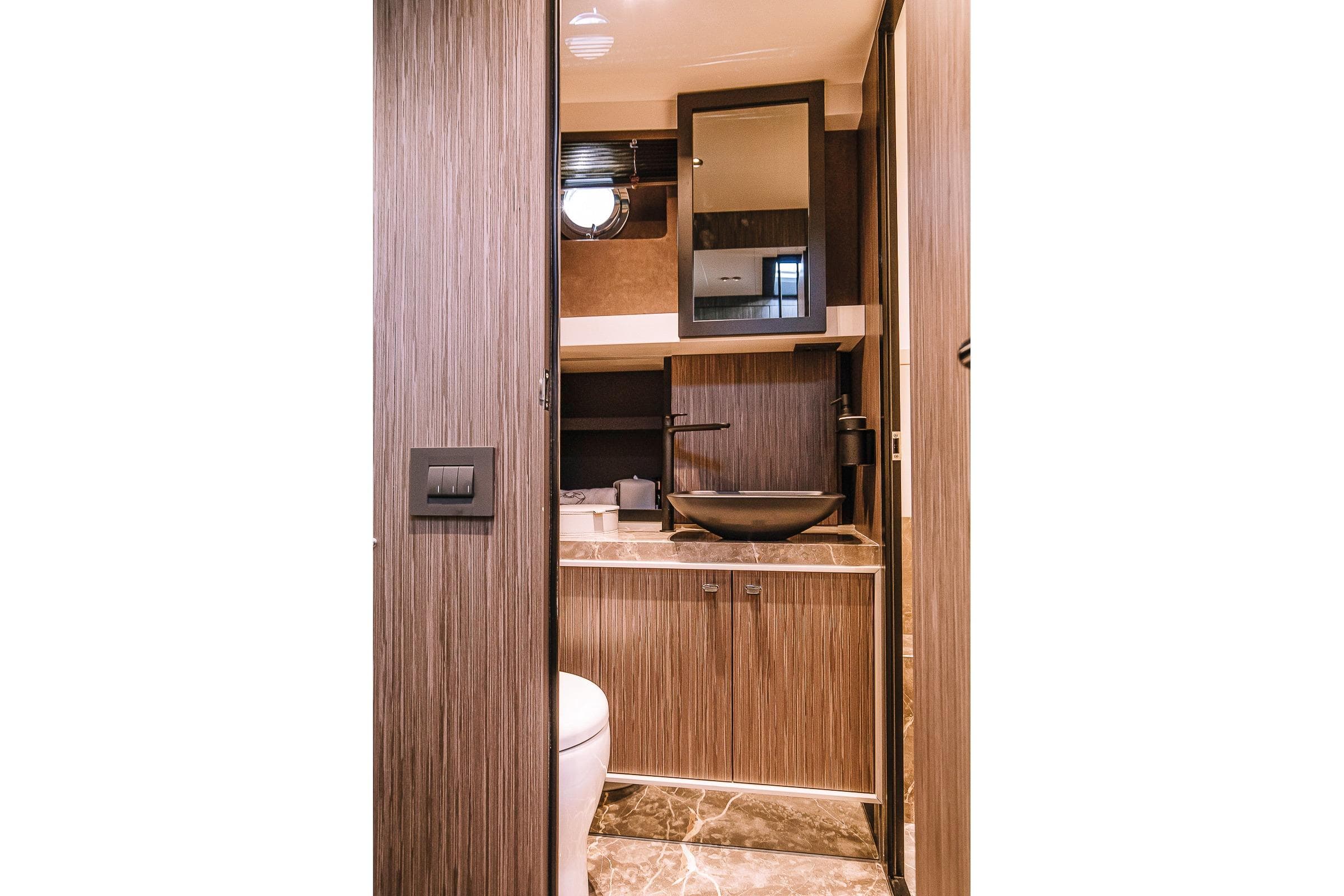 Luxurious bathroom interior of 2026 Cranchi A46 Luxury Tender yacht, featuring modern fixtures and elegant design.
