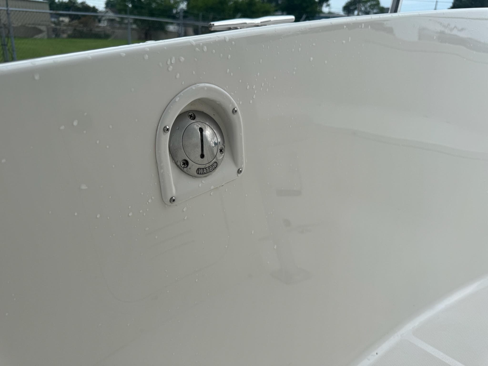 Water inlet on 2004 Robalo R230 Center Console boat, close-up view.