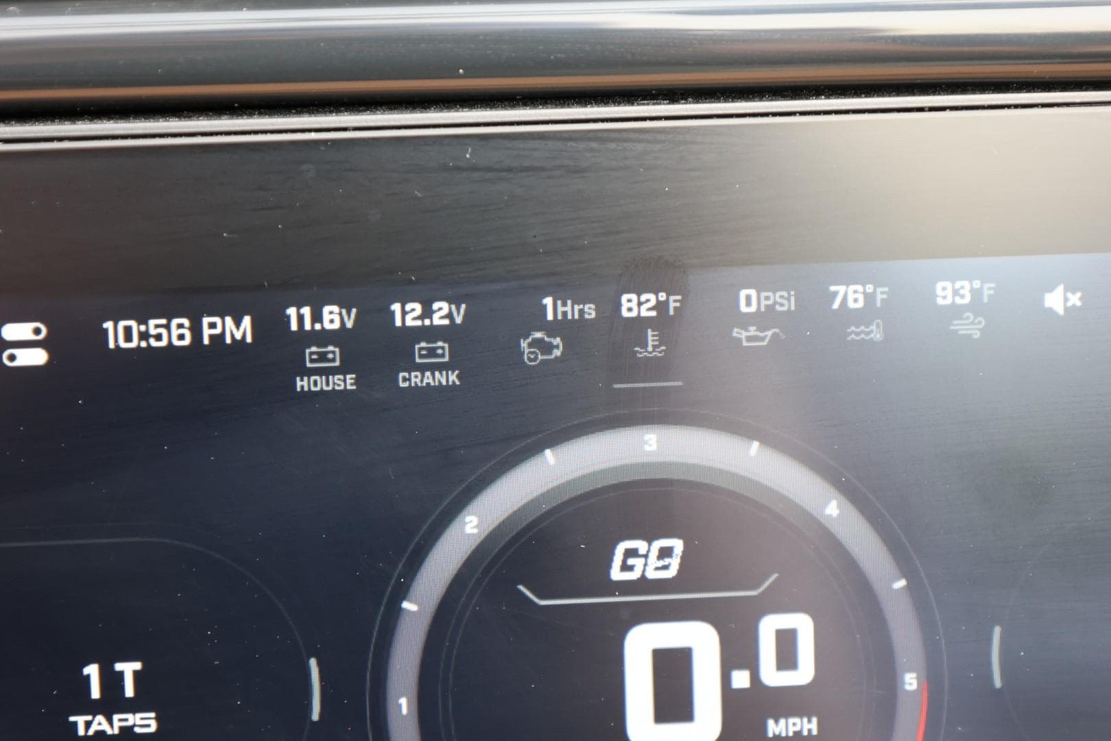 ATX Surf Boats 2026 dashboard display showing time, voltage, temperature, and speedometer.
