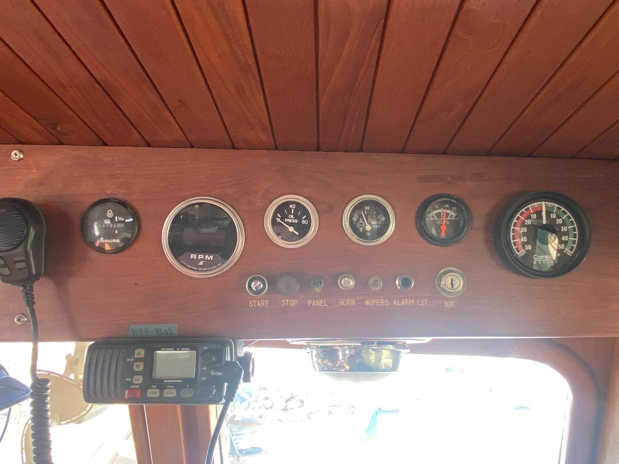 1980 Ocean Alexander 40 Double Cabin dashboard with gauges and radio equipment.