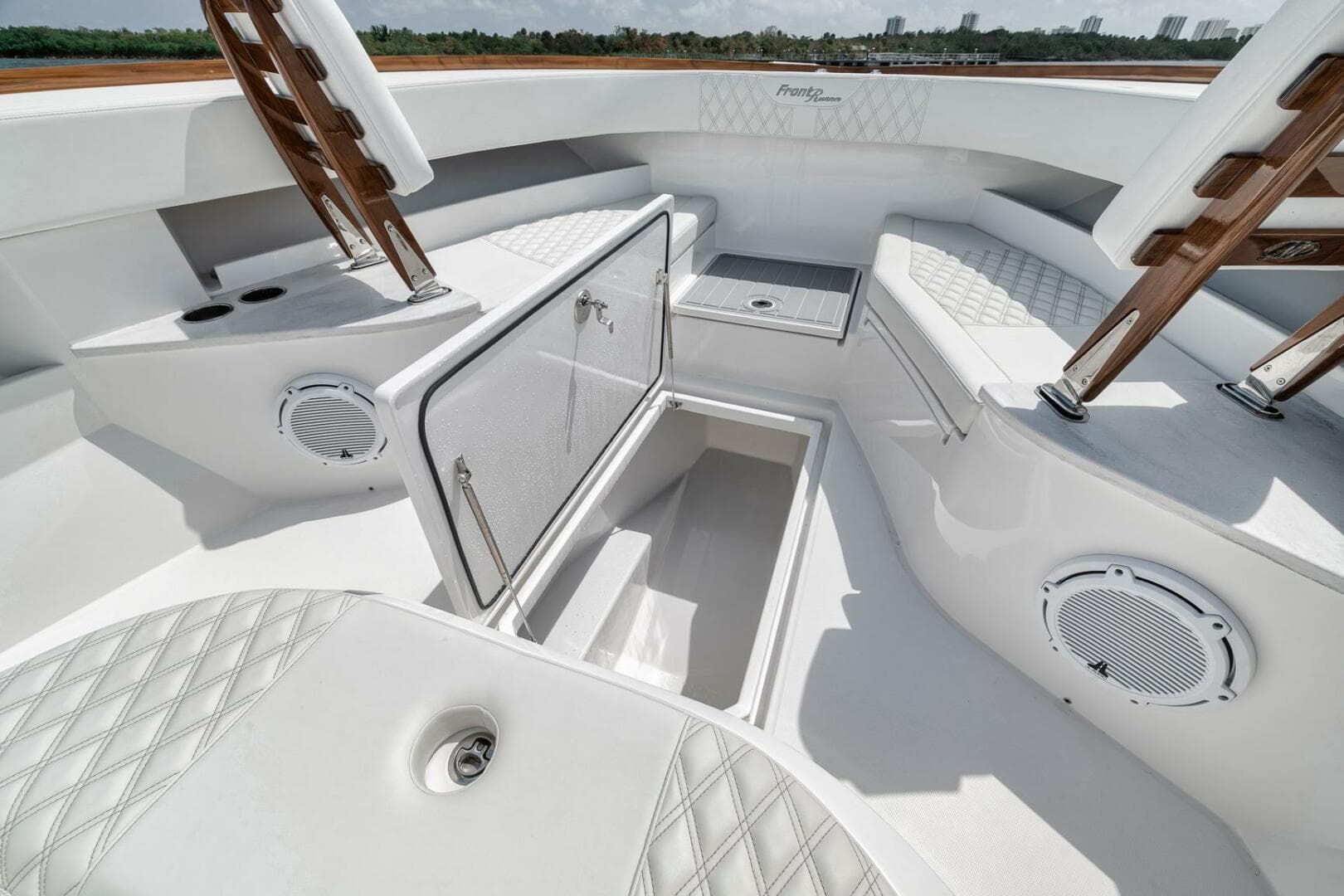 2024 Front Runner 47 Center Console boat interior with storage and seating.
