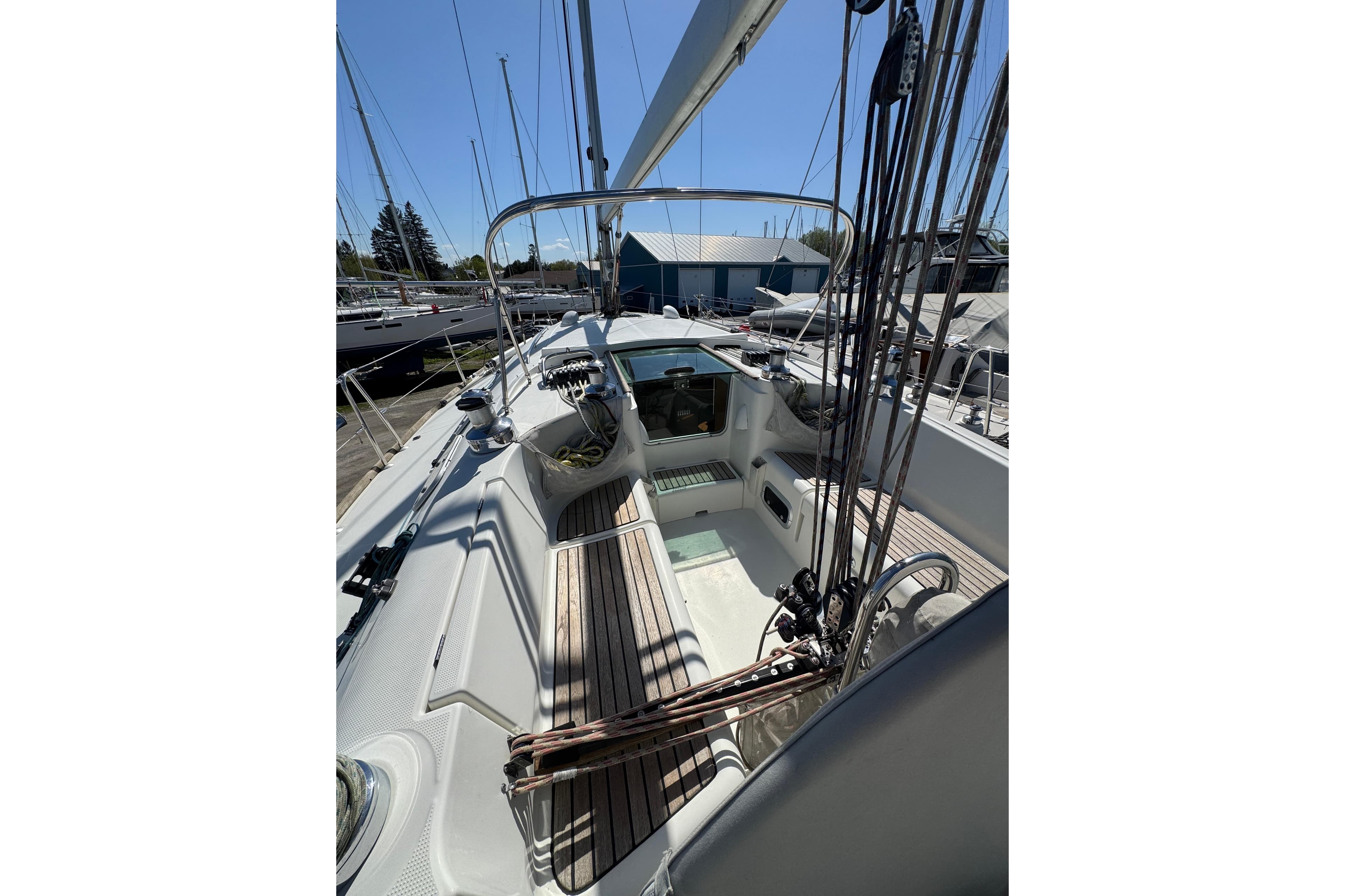 Cockpit view of 1996 Beneteau First 42s7 sailboat, showcasing deck and rigging.