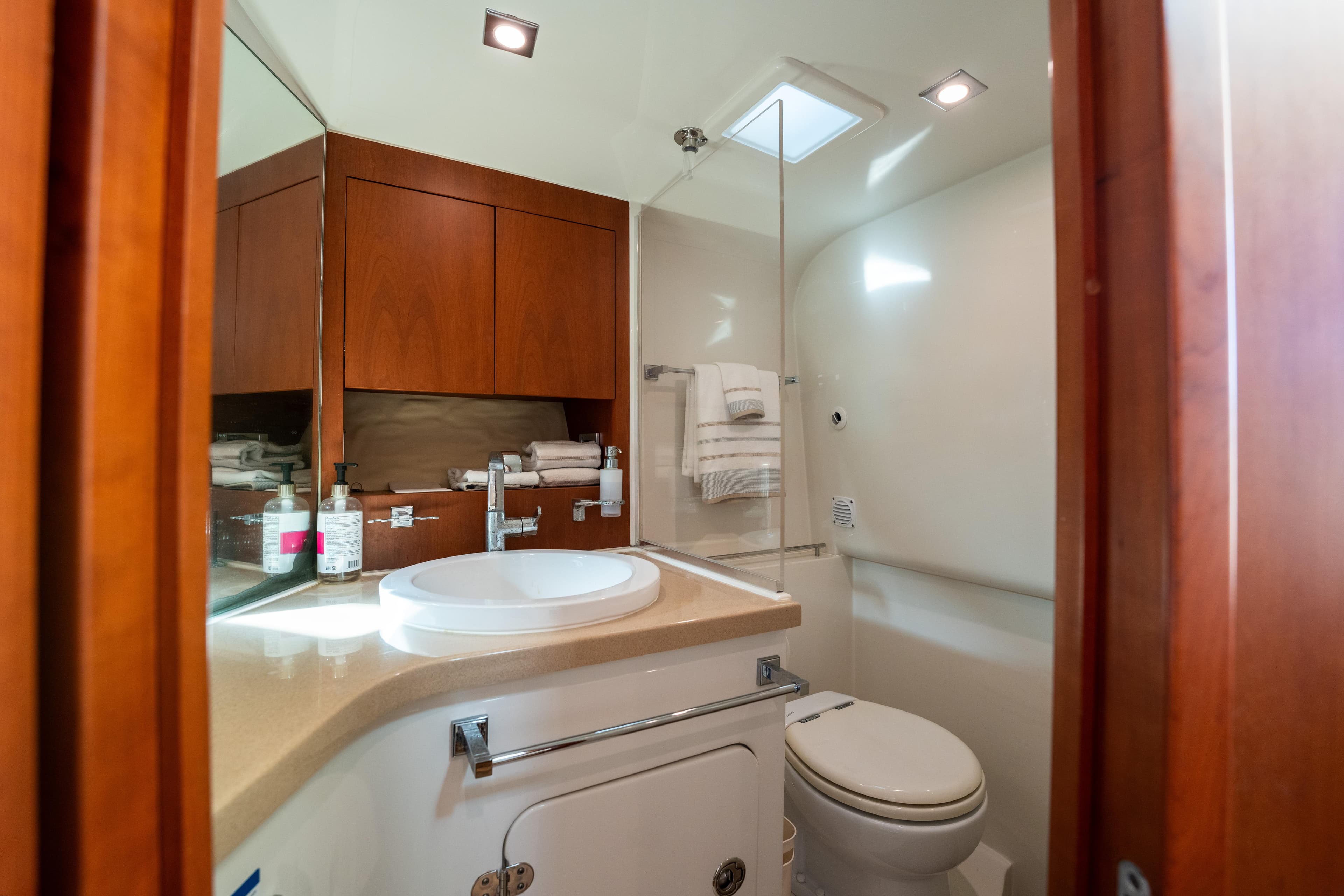 Luxurious bathroom in 2014 Chris-Craft Corsair 36 Hard Top yacht.