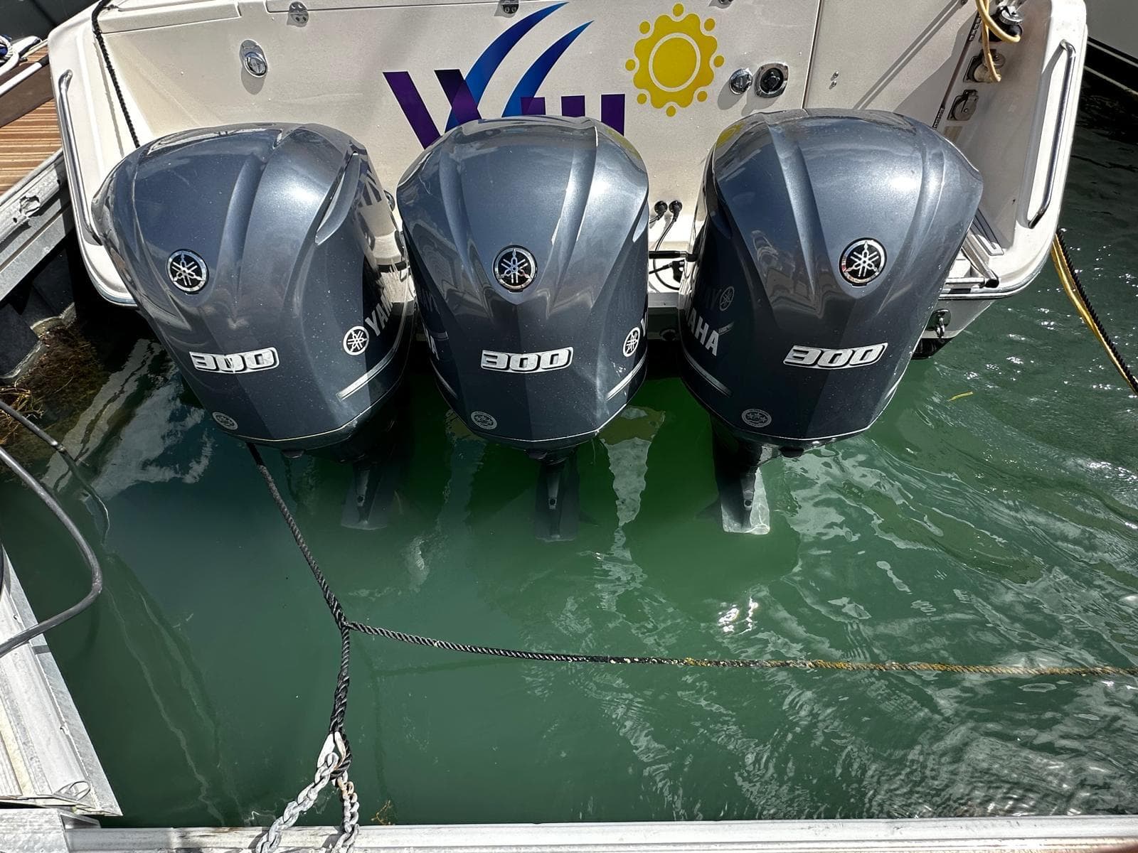 Three Yamaha 300 outboard engines on a 2016 Grady-White Express 370 boat.