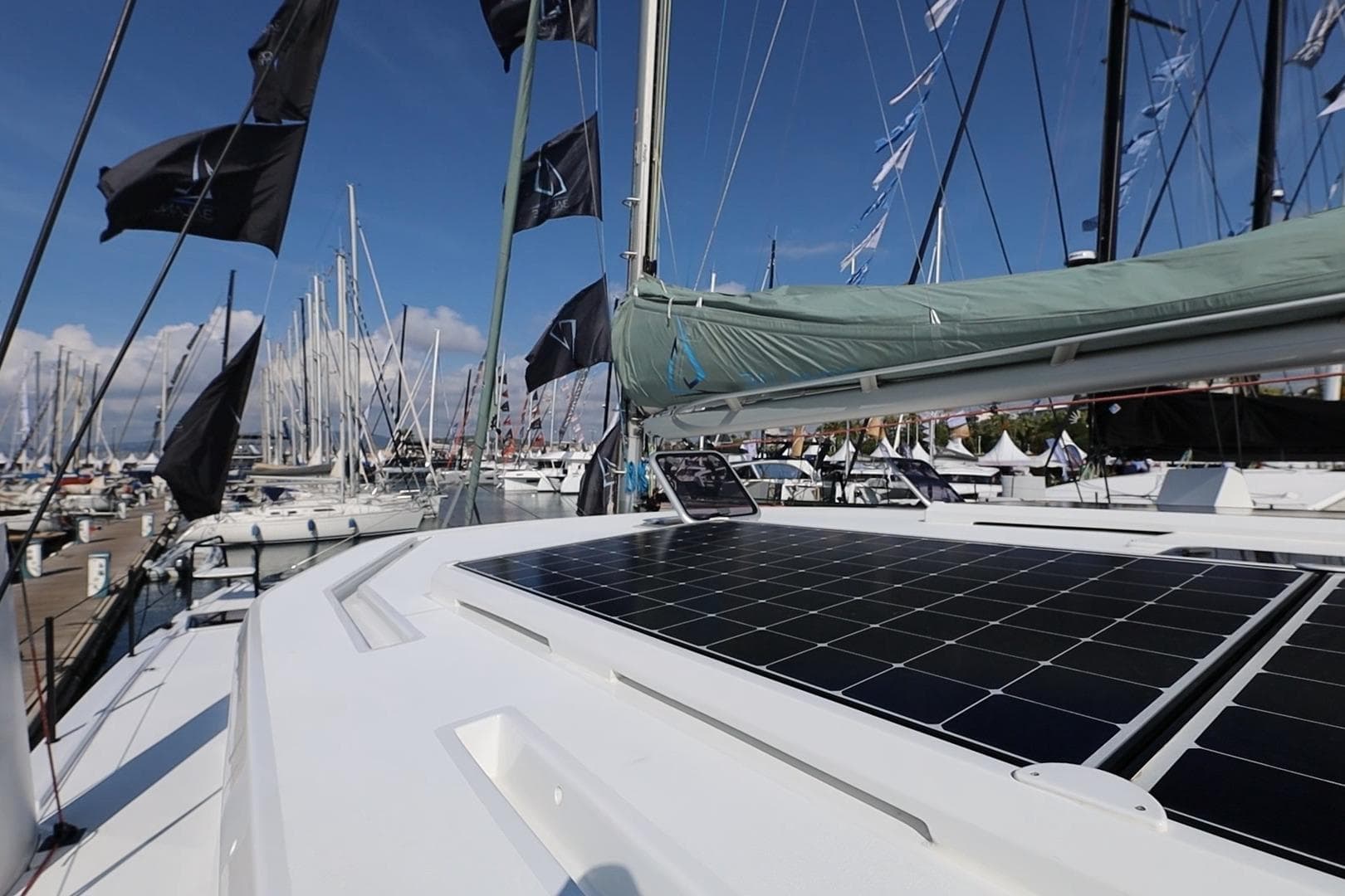 Sailboat with solar panels at marina, Balance 442 model, 2023.