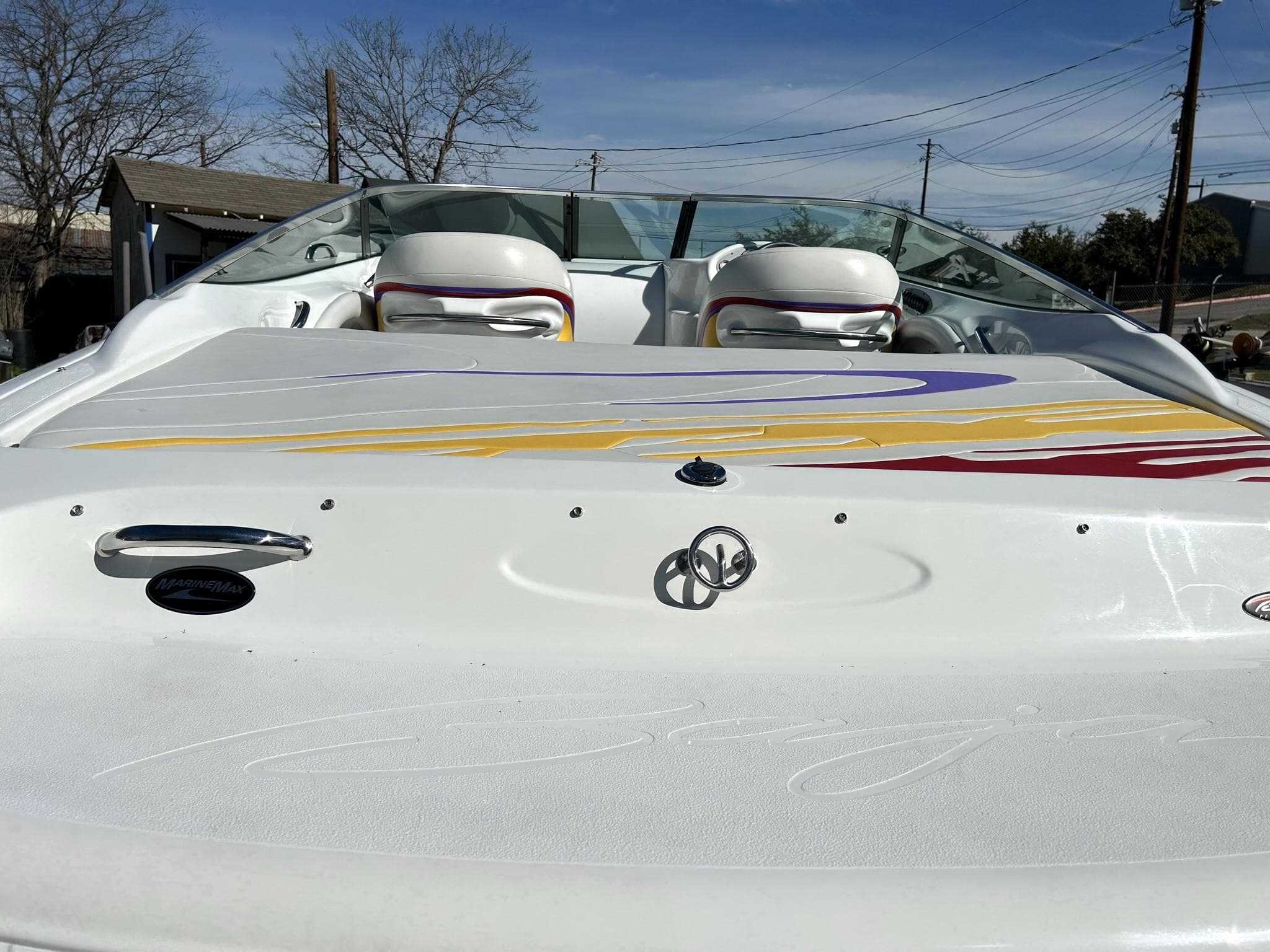 2002 Baja 232 speedboat with colorful graphics and sleek design.