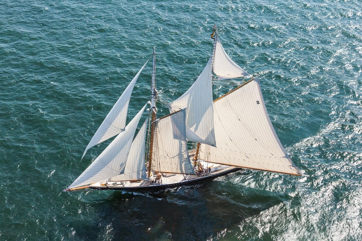 Aerial view of a 2014 Custom Eastern Shipbuilding Schooner sailing on open water.