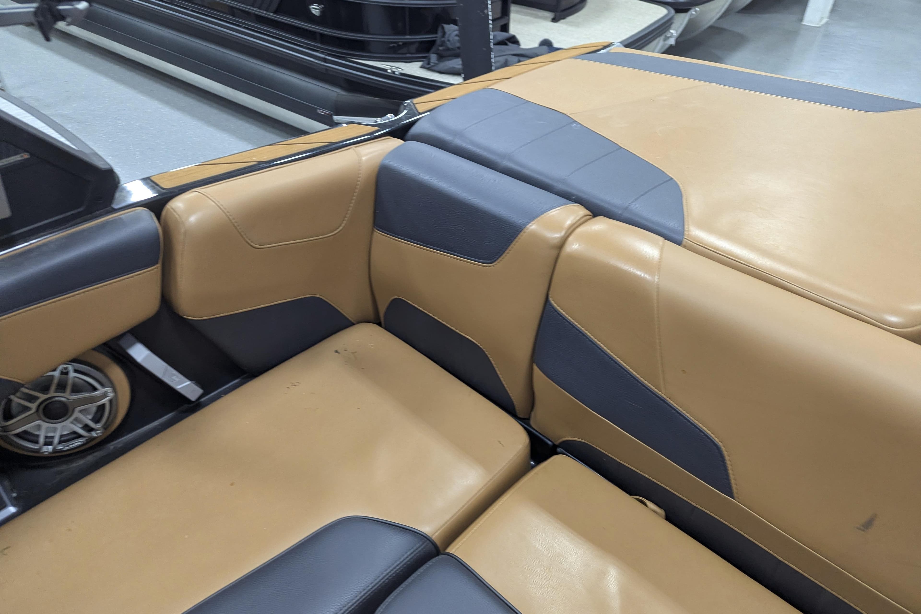 2022 Malibu Wakesetter 22 LSV interior with tan and gray seating.