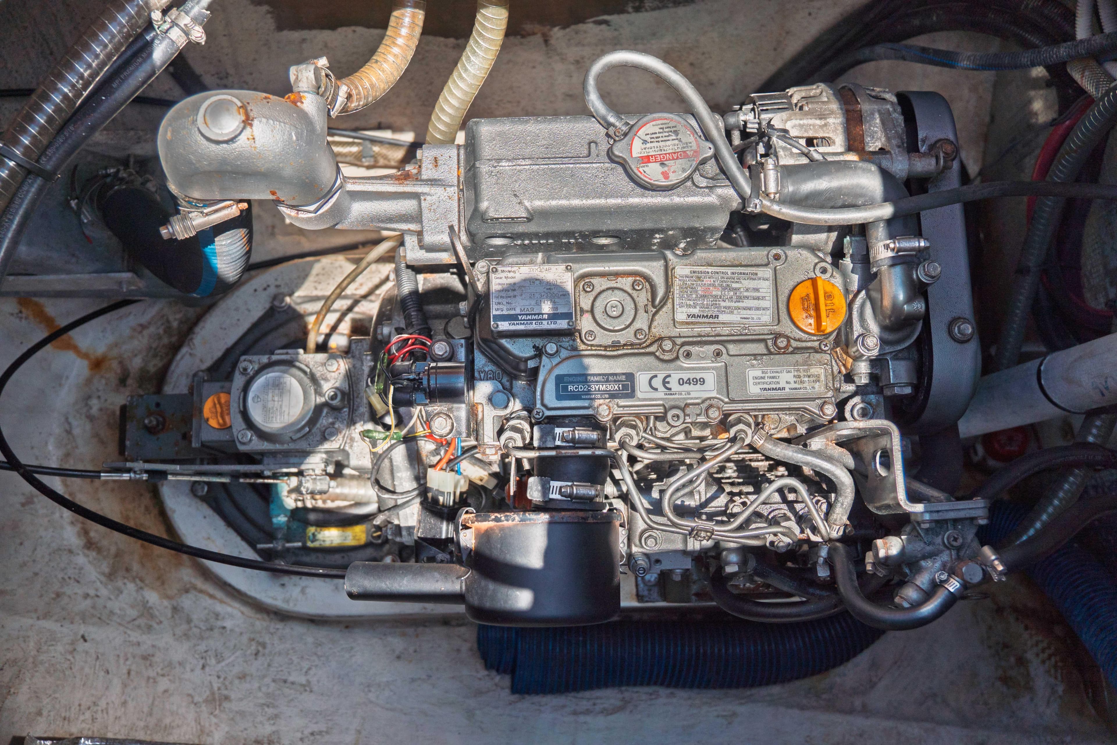 Engine compartment of a 2005 Fountaine Pajot LAVEZZI 40 catamaran, showcasing mechanical components.