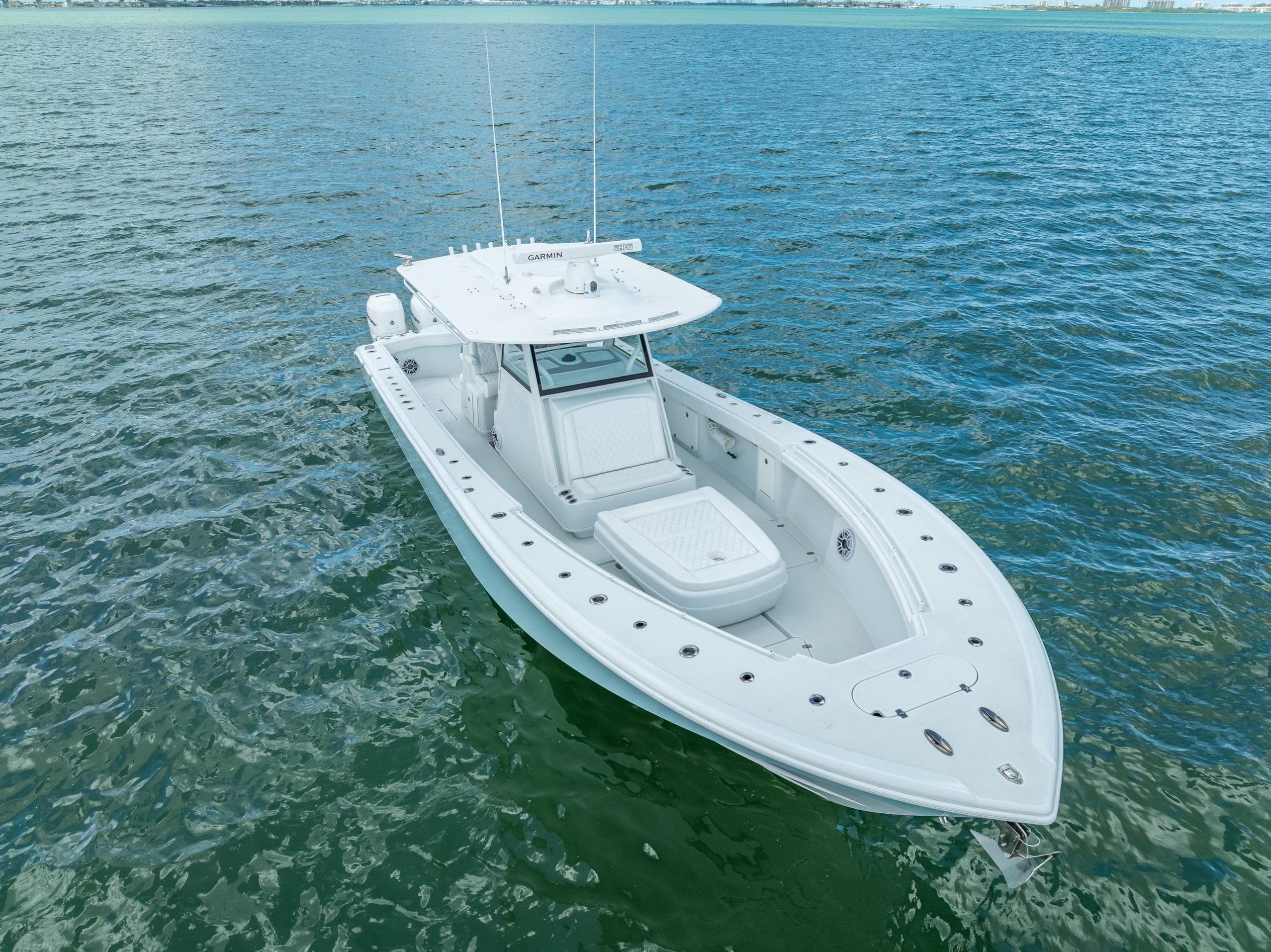 2023 Yellowfin 39 Offshore boat on calm blue water.