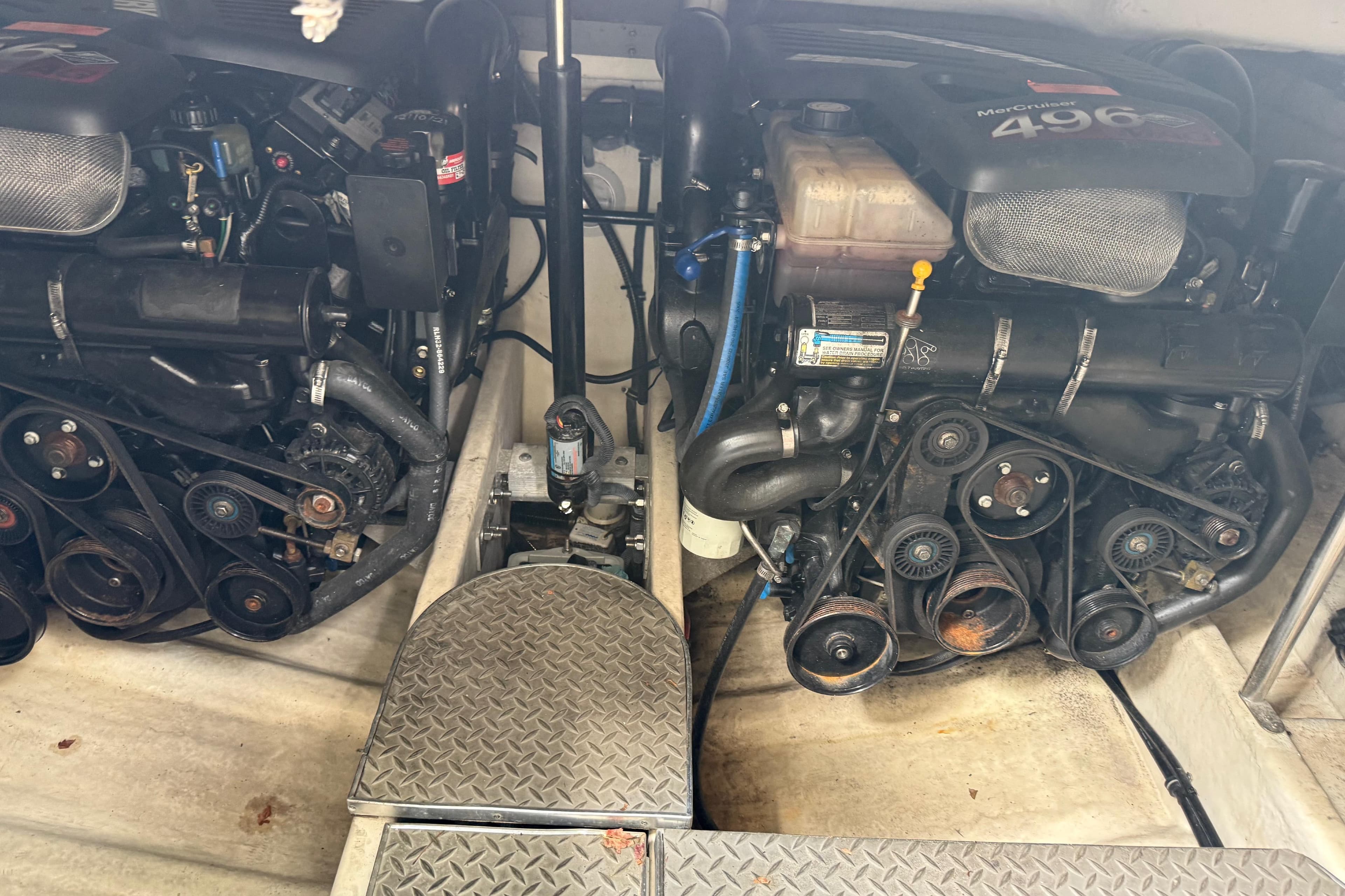 Engine compartment of a 2003 Formula 37 PC boat with dual MerCruiser 496 engines.