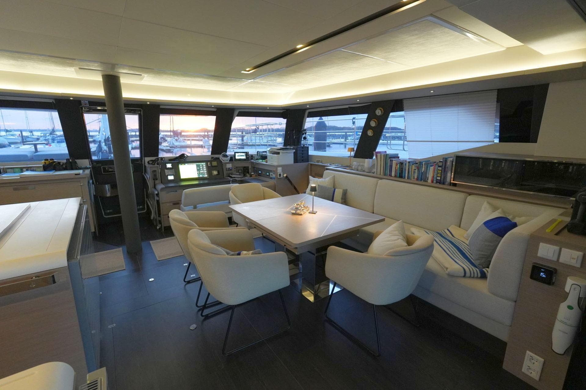 Luxurious interior of 2022 Fountaine Pajot Alegria 67 yacht with elegant seating and modern design.