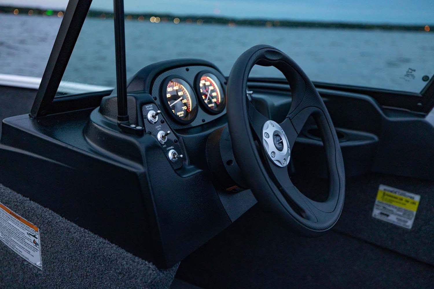Manufacturer Provided Image: Steering console of 2026 Crestliner 1650 Kodiak WT boat at dusk on water.