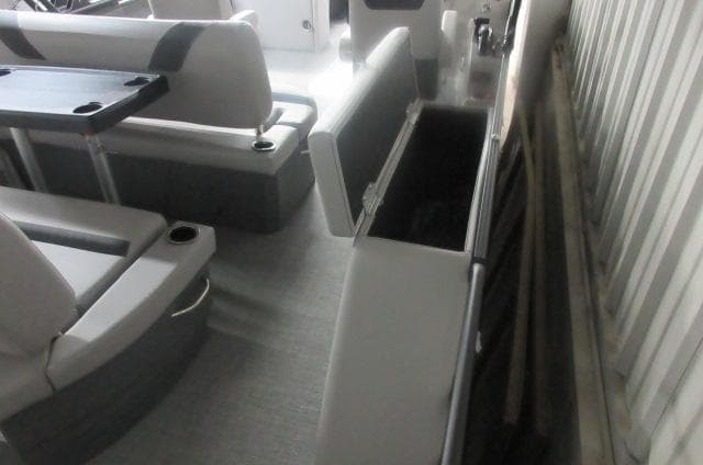 2025 Sylvan L3 DLZ boat interior with seating and storage compartments.