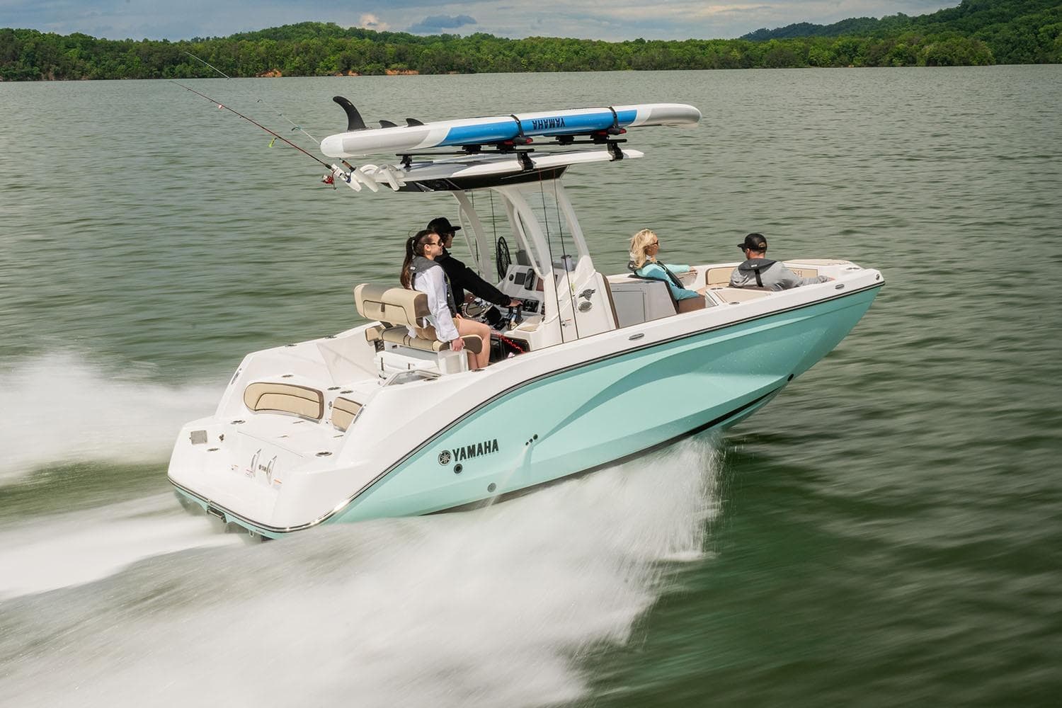 Manufacturer Provided Image: 2026 Yamaha Boats 222 FSH Sport E cruising on a lake with passengers onboard.