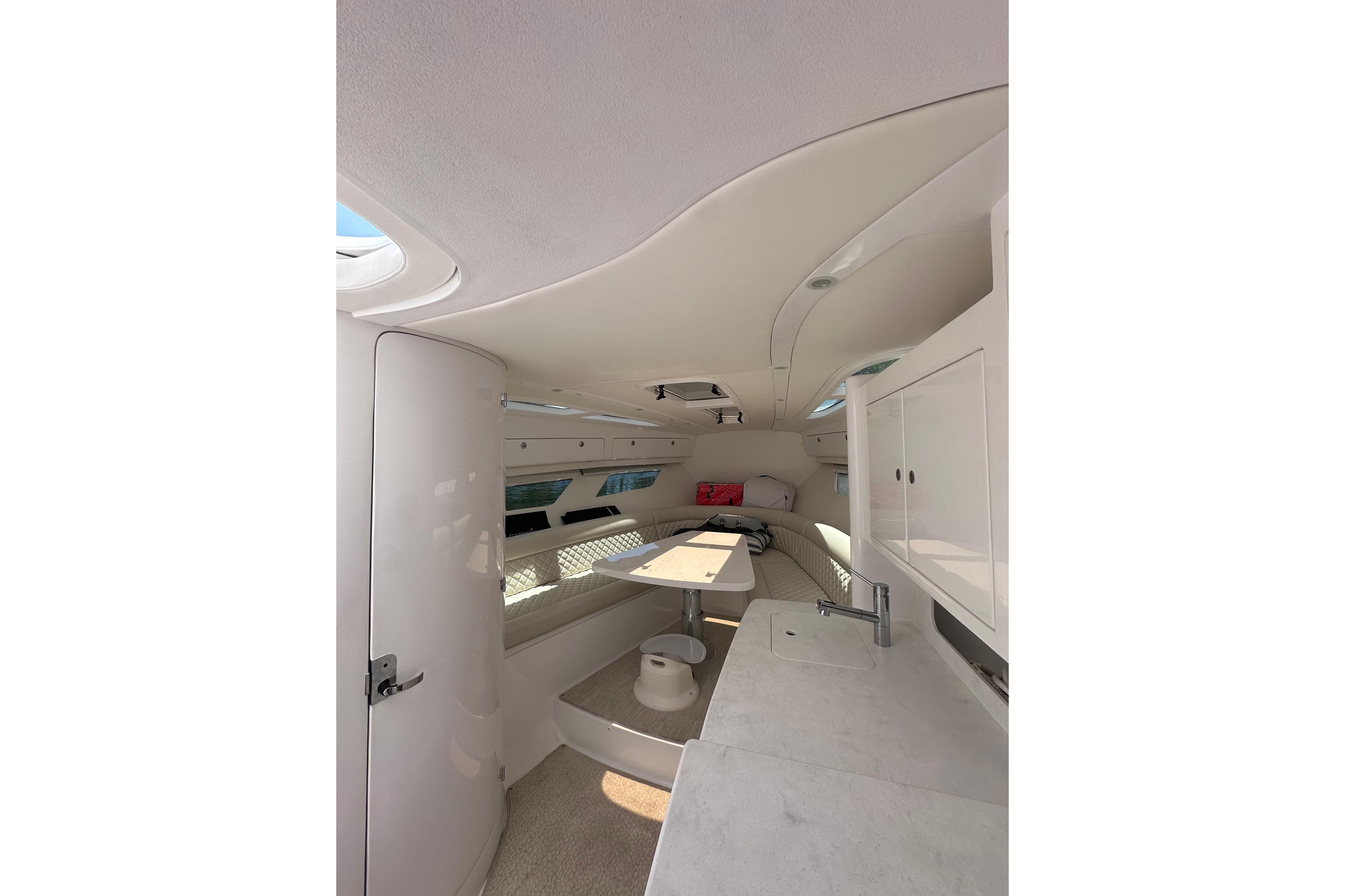 Interior of 2024 Intrepid 41 Valor yacht, featuring sleek white design and modern amenities.