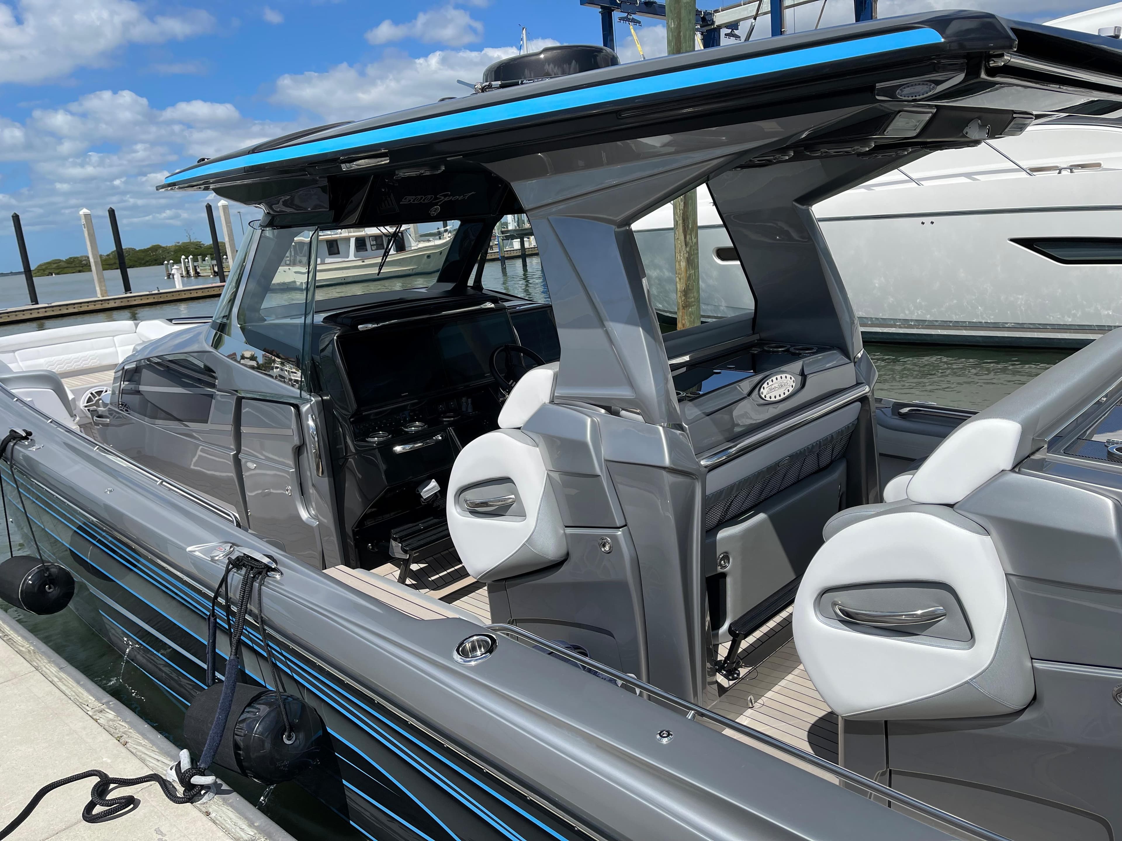 2025 Nor-Tech 500 Sport boat docked, showcasing sleek design and modern features.