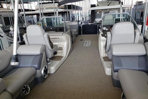 Interior of 2014 Premier Yachts 250 S-Series RF, featuring luxurious seating and modern design.