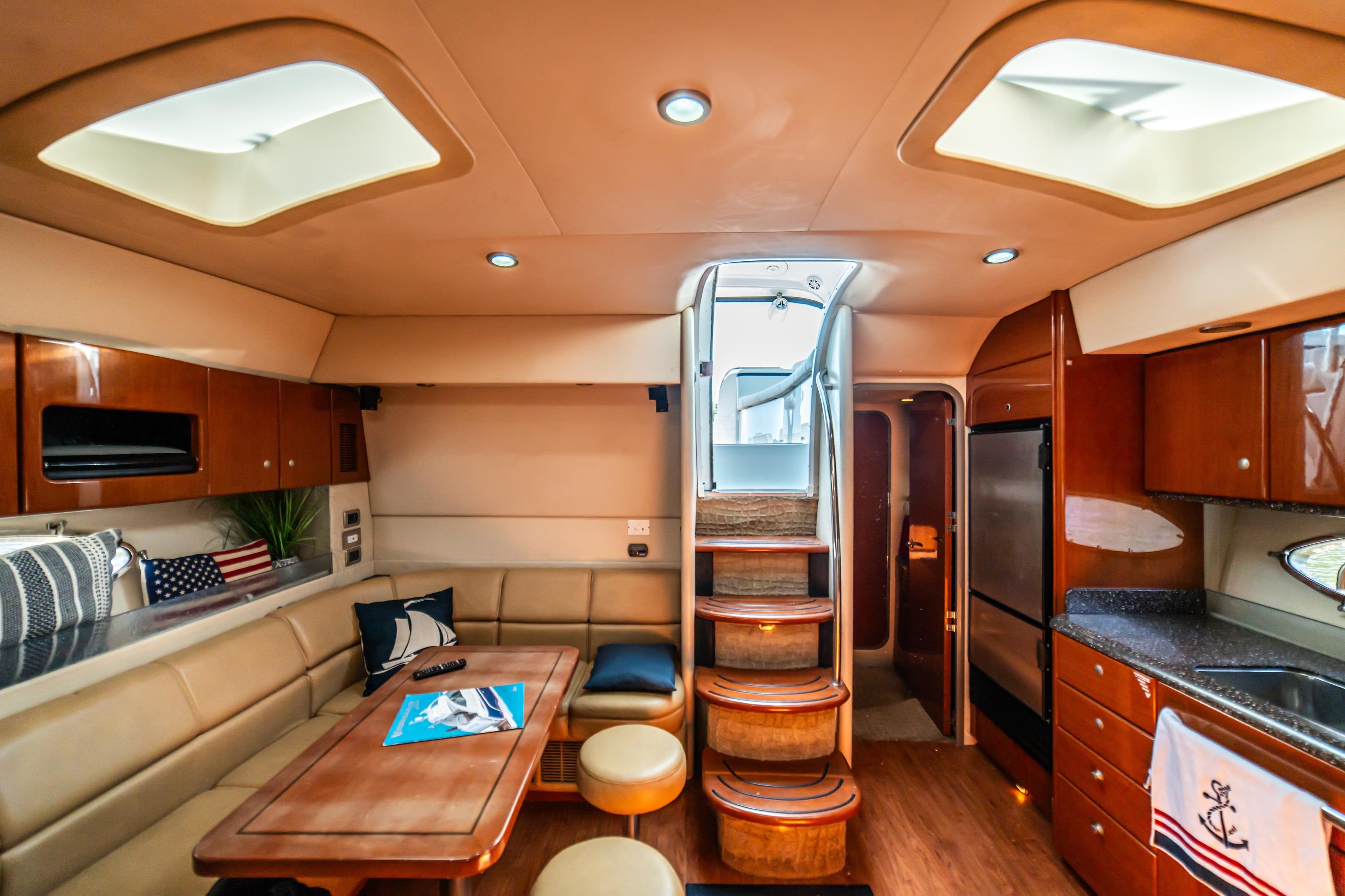Luxurious interior of a 2008 Formula 45 Yacht with elegant wood finishes and modern amenities.