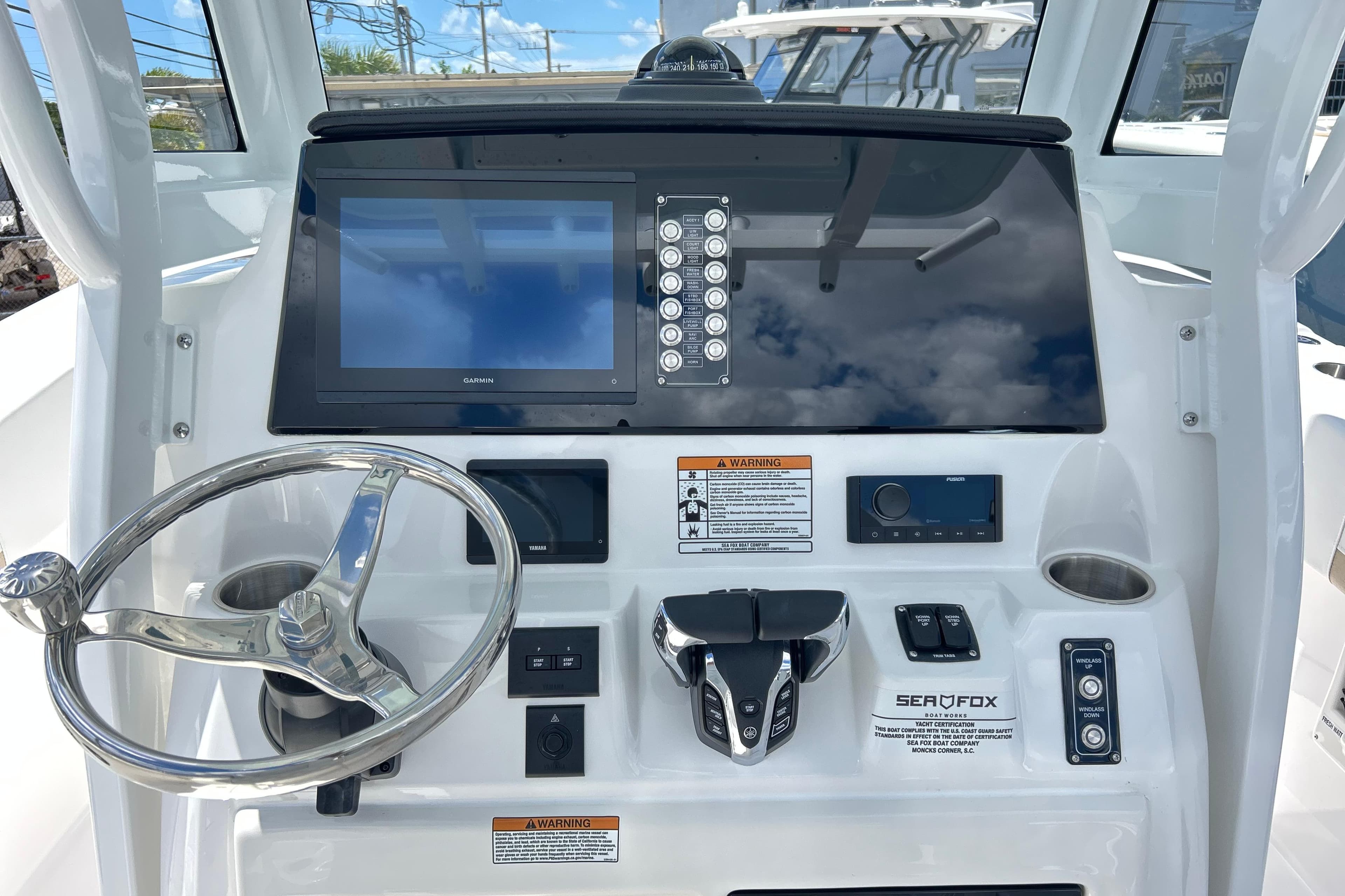 2026 Sea Fox 268 Commander dashboard with steering wheel, touchscreen, and control panel.