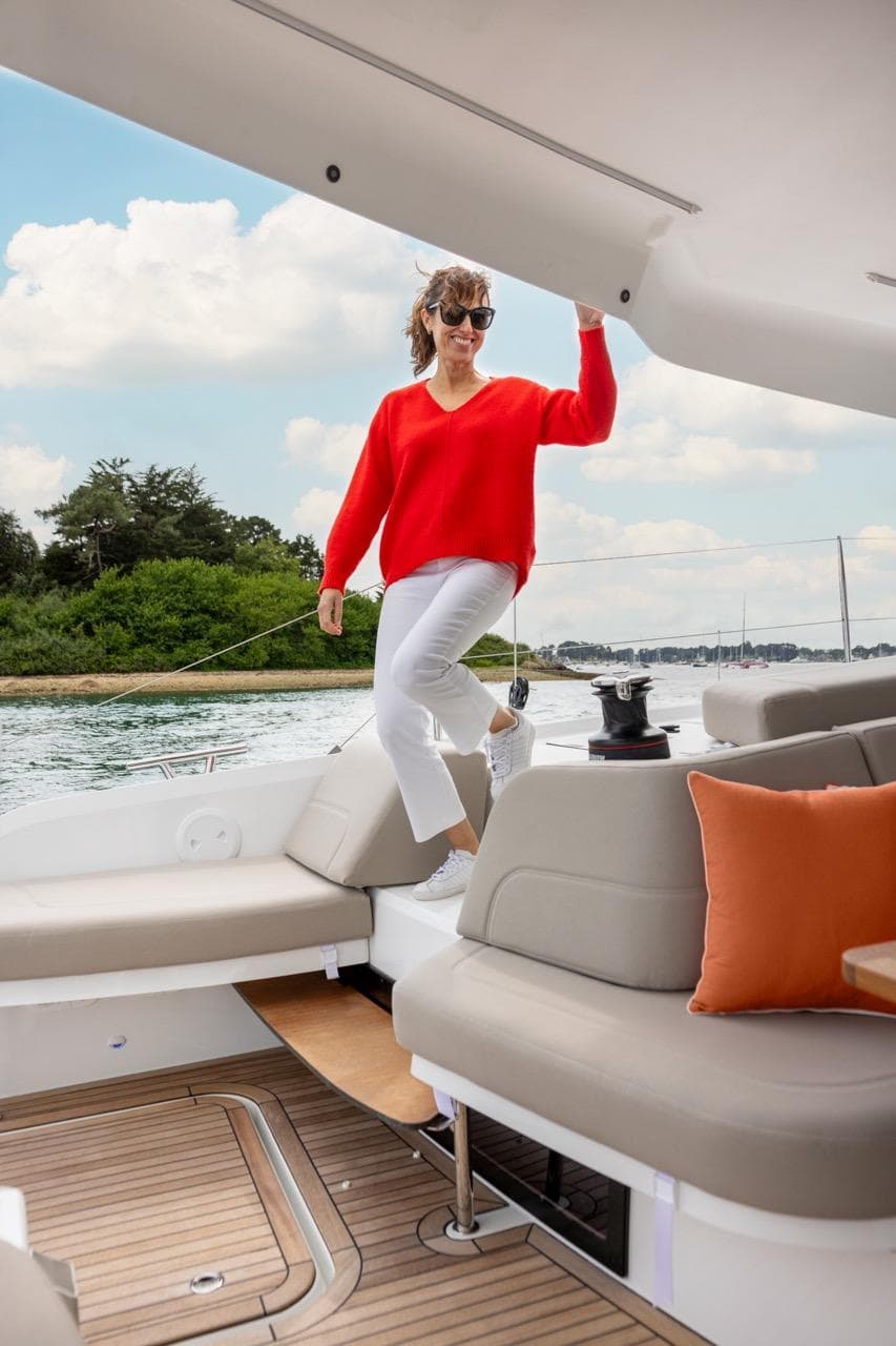 Woman enjoying a sunny day on a 2026 Fountaine Pajot NEW 41 yacht.