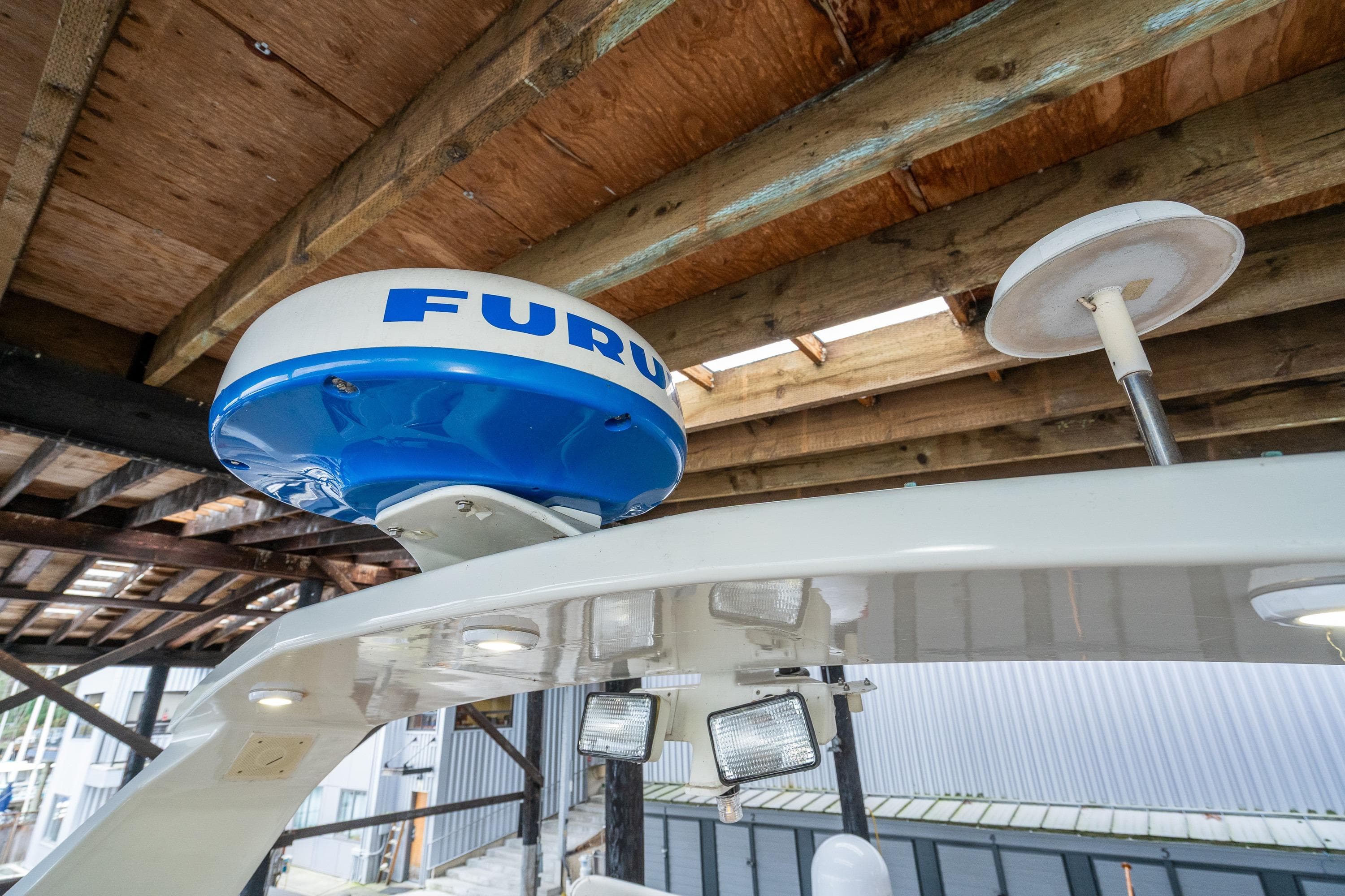 Radar equipment on 1973 American Marine Alaskan 53 boat under wooden roof.