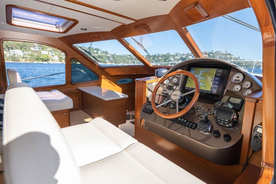 Interior of 2026 Palm Beach Motor Yachts PB45, featuring luxurious helm and seating.
