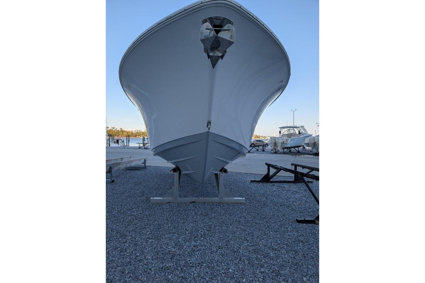 2024 Sportsman Open 302 Center Console boat on display, front view.