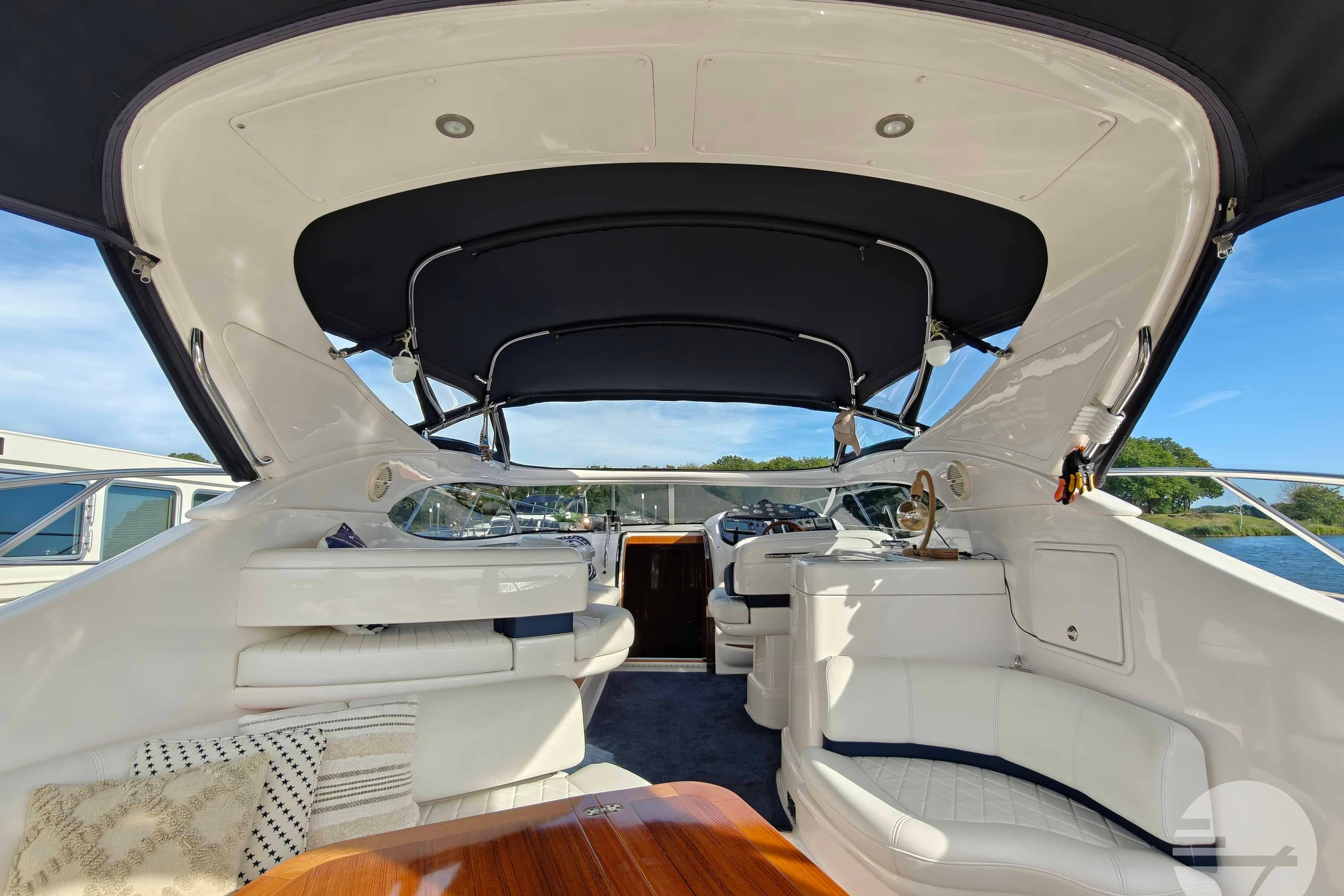 Interior view of 2004 Neptunus 41 Sport yacht with elegant seating and canopy.