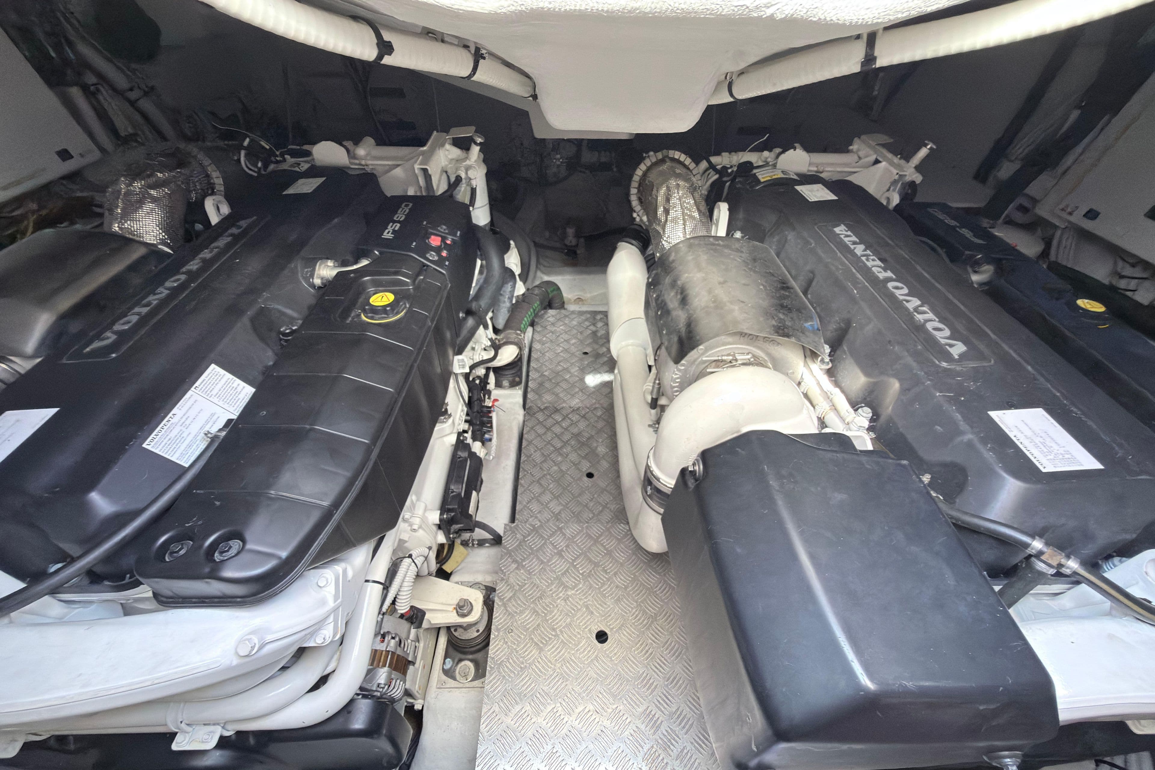 Engine room of 2023 Pershing 5x yacht with Volvo Penta engines.