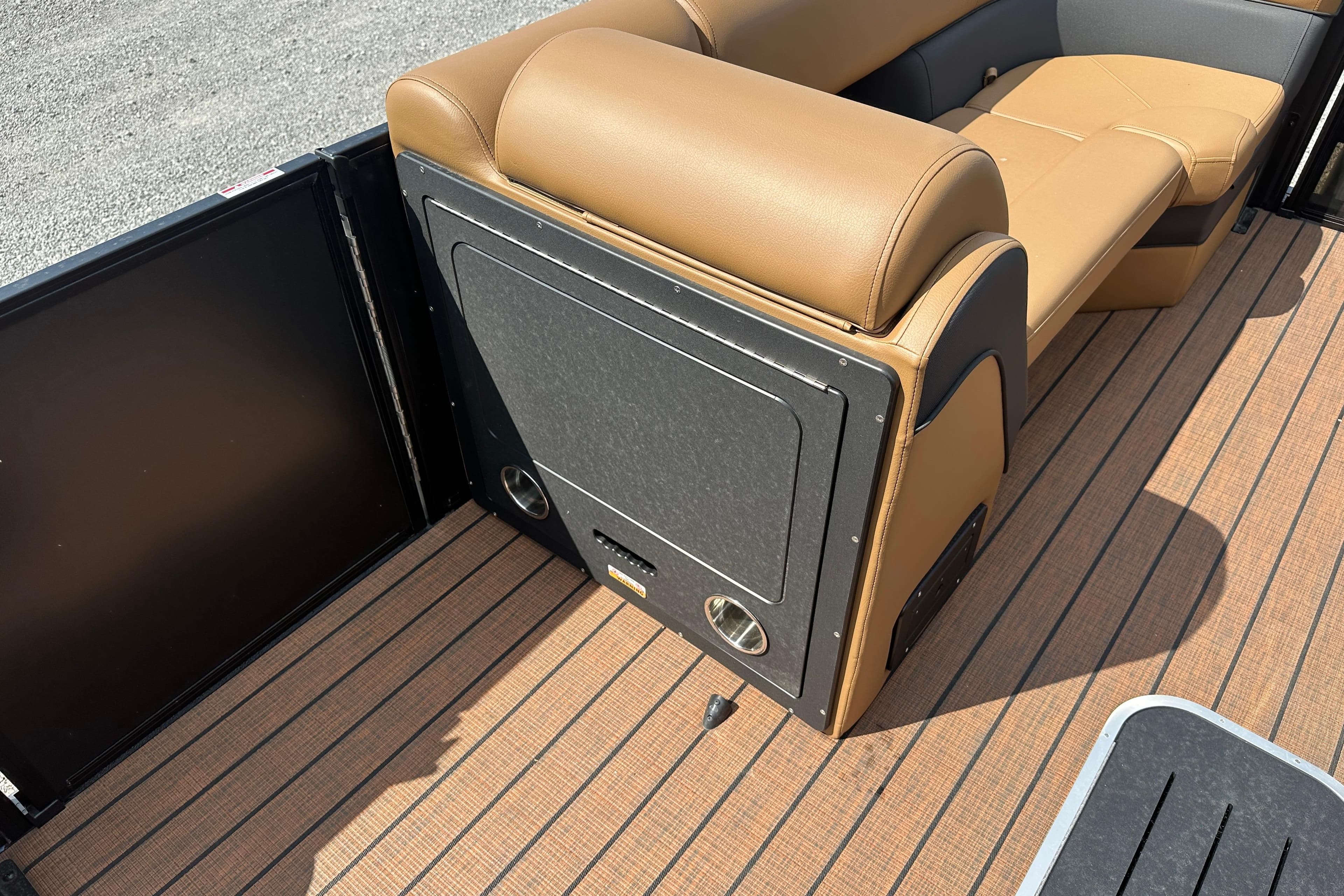 2025 Bentley Pontoons 223 Elite Swingback interior with tan seating and wood-style flooring.
