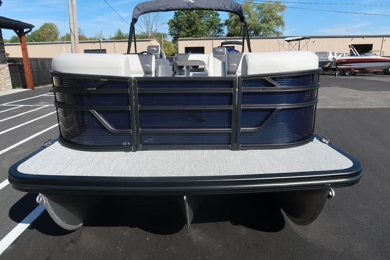 2026 Bennington S Swingback 22 SSB pontoon boat, rear view in a parking lot.