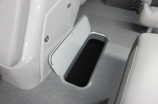 2025 Sylvan L3 DLZ boat interior storage compartment with open hatch.