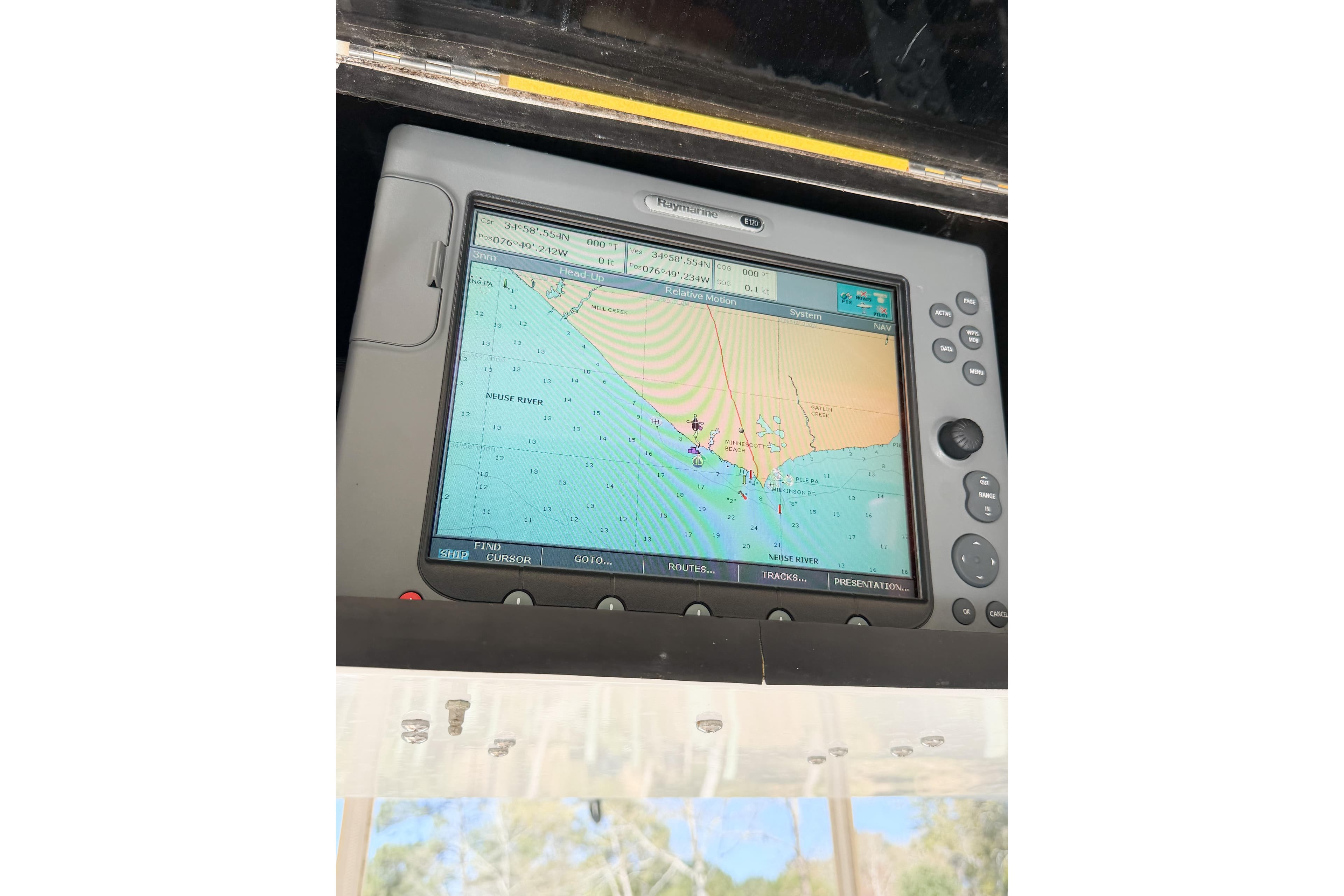 Navigation system display on 1988 Pacemaker 36 Convertible boat.