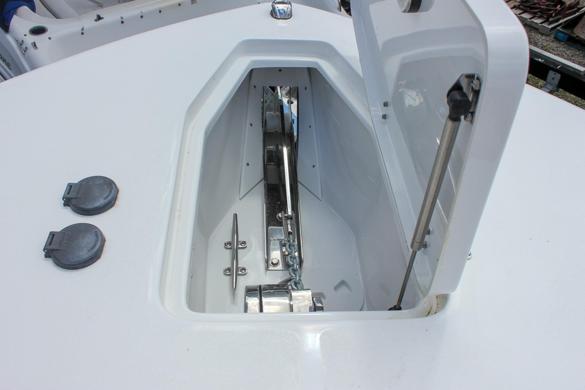 Anchor storage compartment on 2027 Sea Hunt Ultra 275 Coffin Box boat.