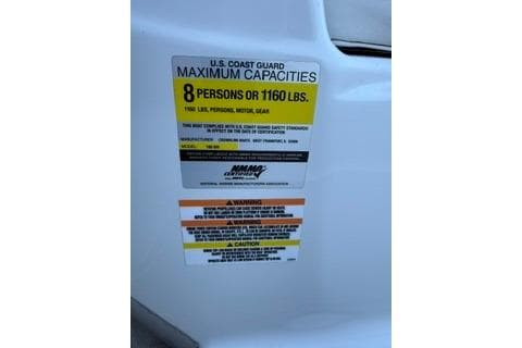 Capacity label on 2006 Crownline 180 BR boat: 8 persons or 1160 lbs.