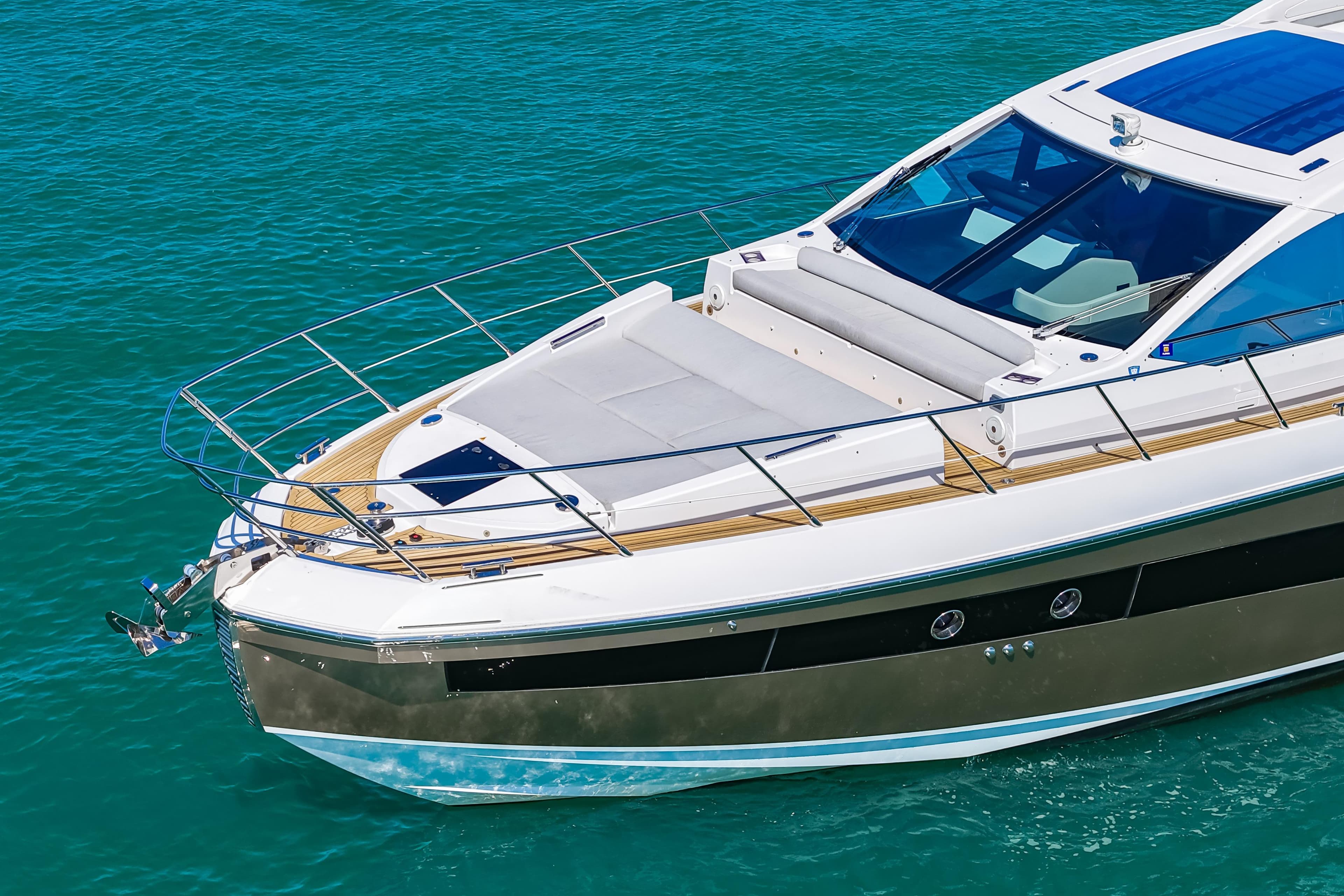 2020 Azimut S6 yacht cruising on clear blue water.
