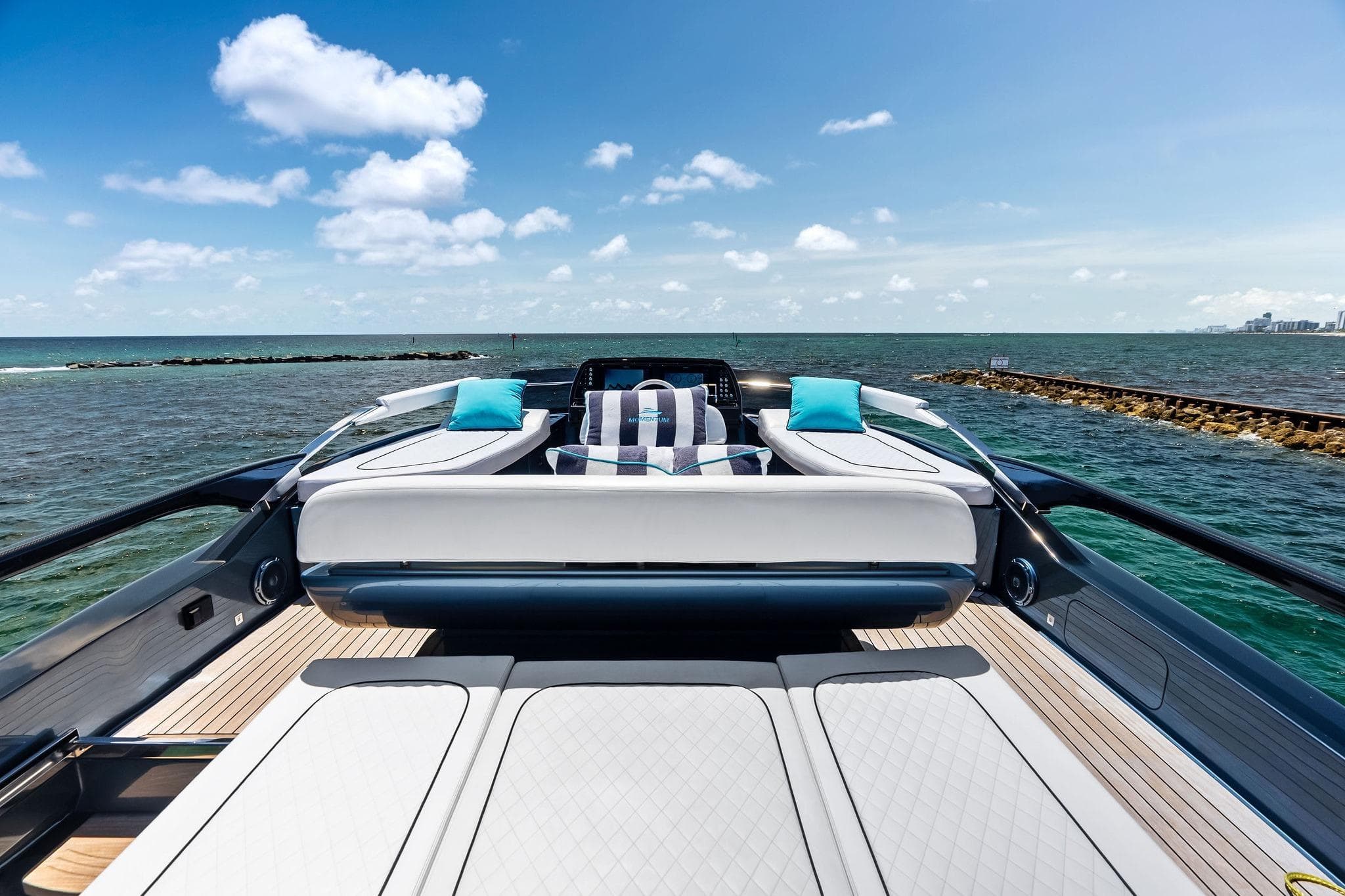 Luxurious 2024 Riva 76 PERSEO Super yacht deck with ocean view and plush seating.