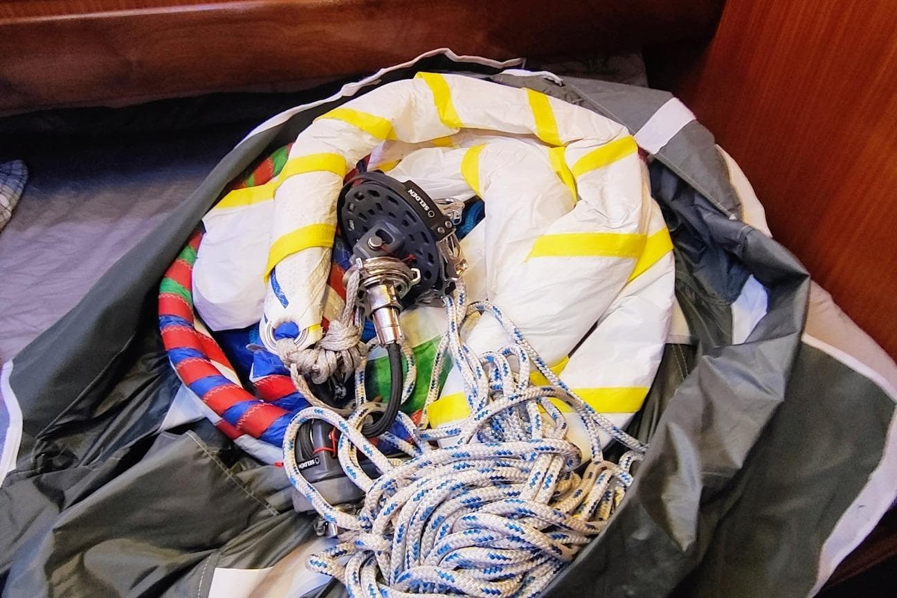 Coiled ropes and sailing gear inside a Bavaria 49 yacht, model year 2003.