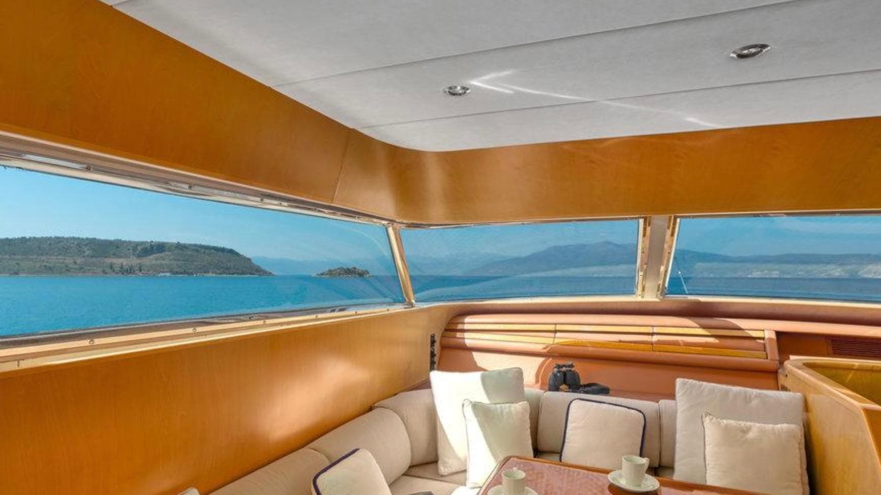 Luxurious interior of 1992 Maiora 28 Flybridge yacht with scenic ocean view.