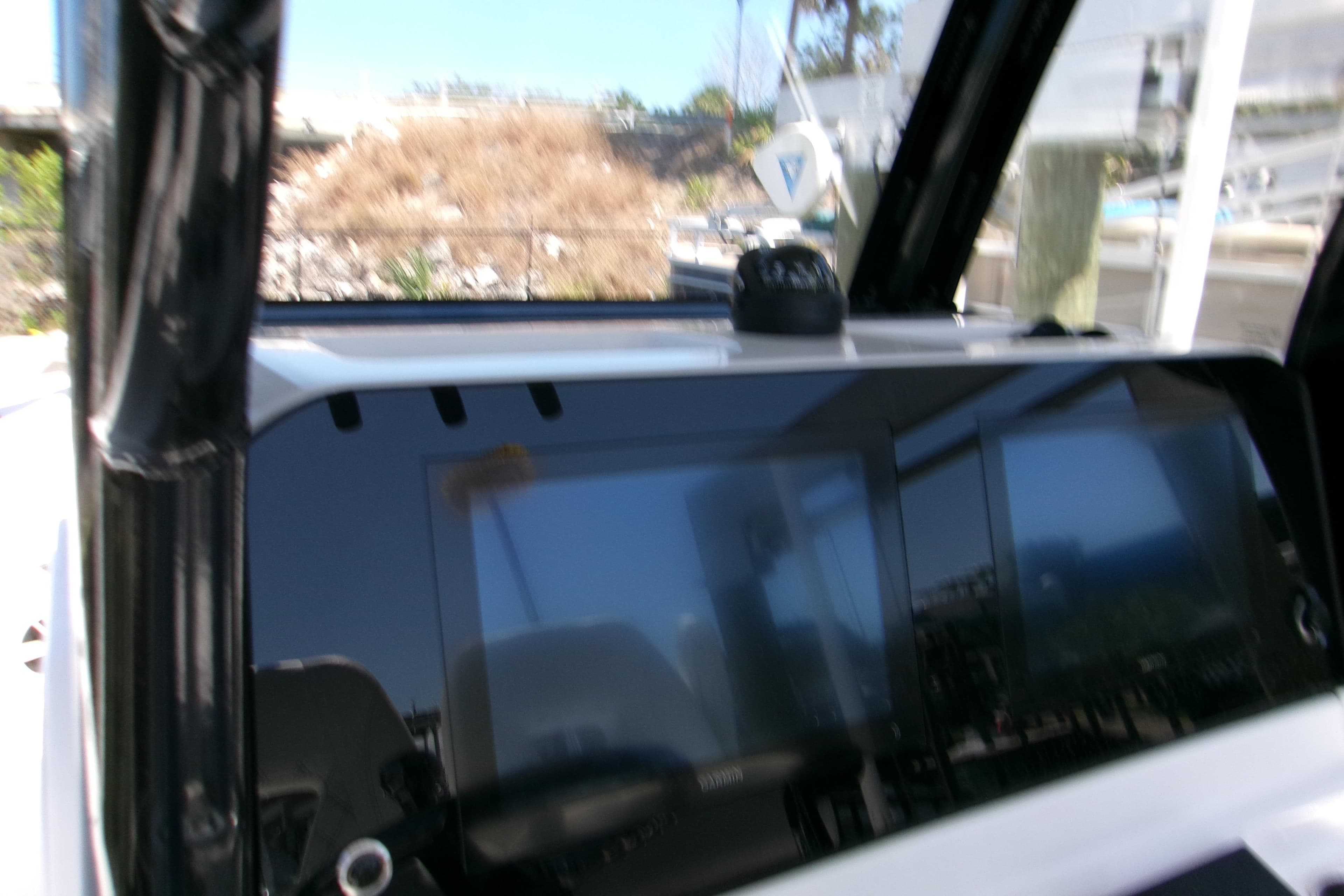 2024 Sportsman Masters 267OE Bay Boat dashboard with modern navigation display.