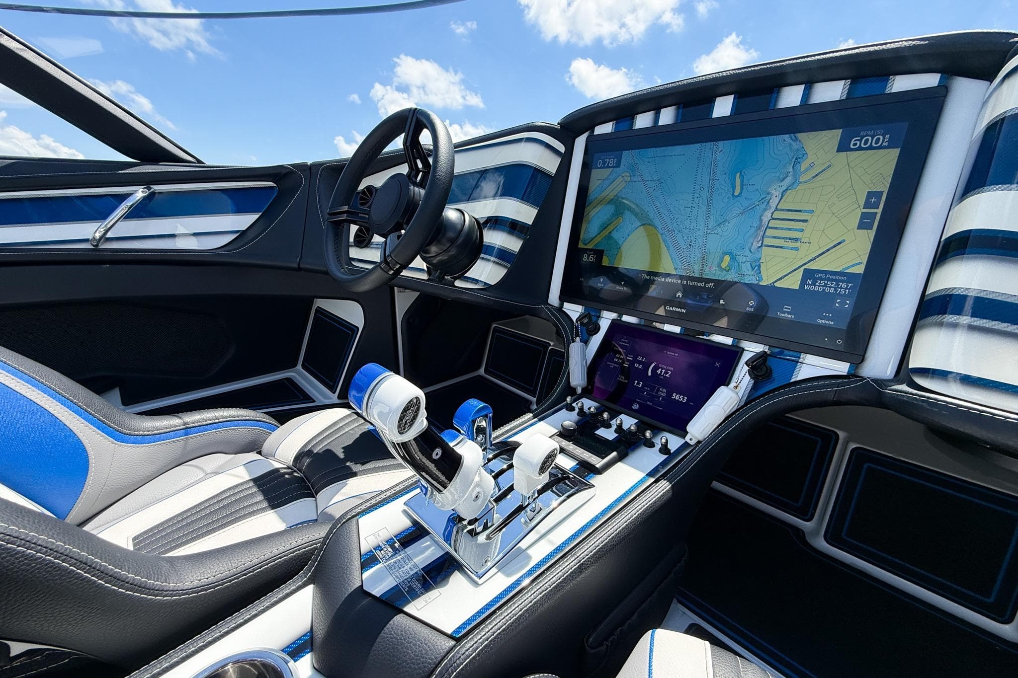 2024 MTI 440X boat cockpit with advanced navigation system and sleek interior design.