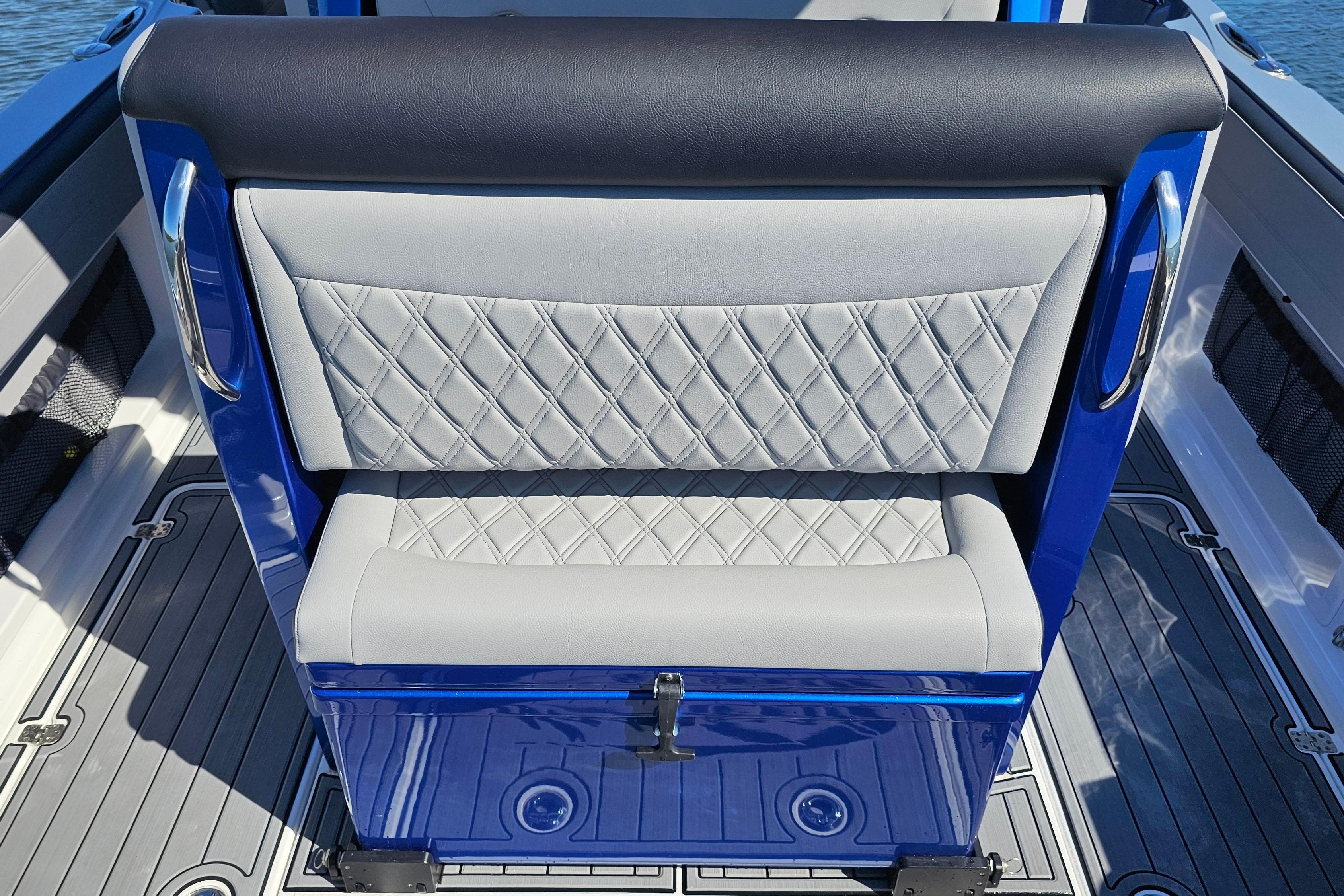 2025 Nor-Tech 390 Sport Center Console seat with diamond-stitched upholstery and sleek blue accents.