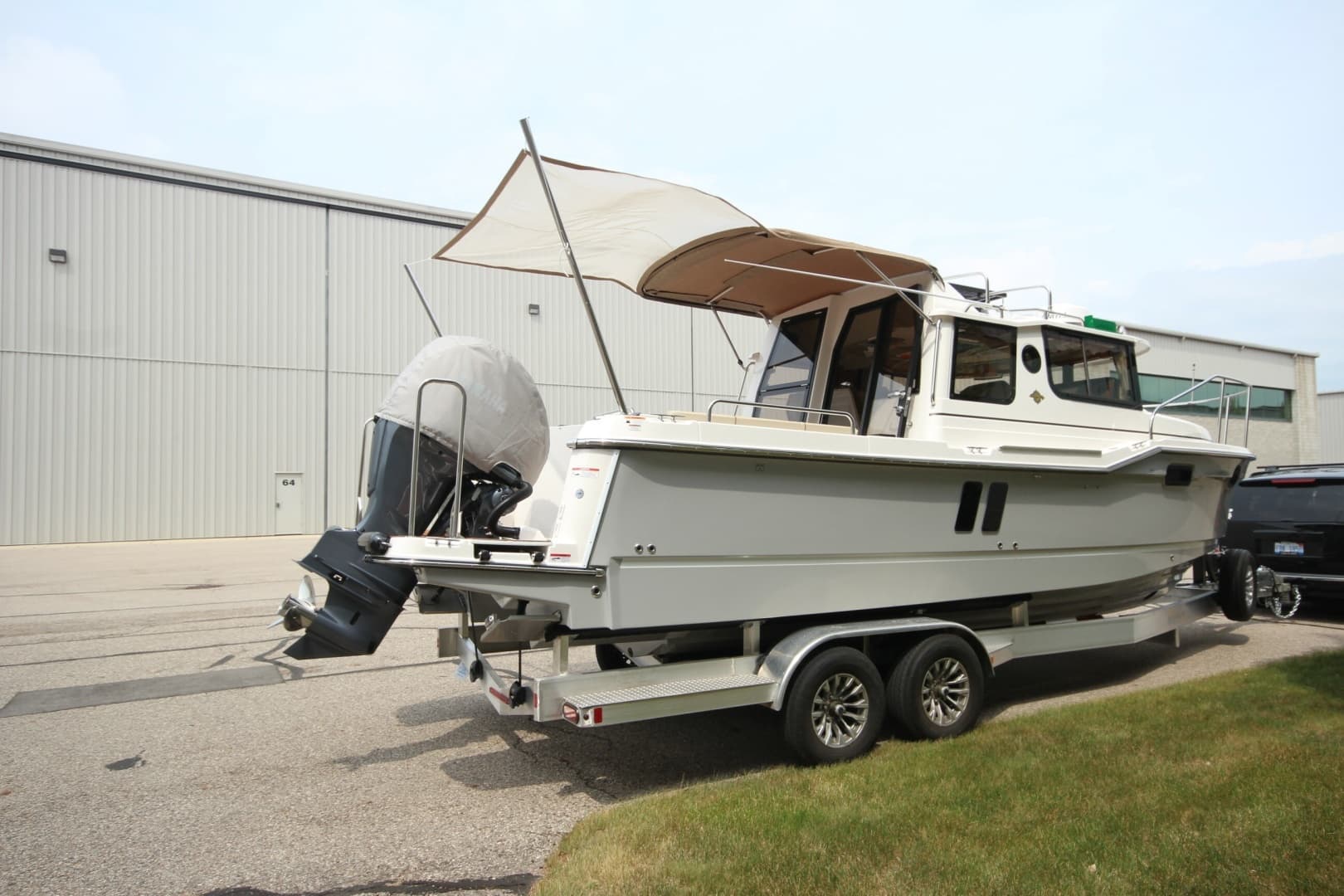 2025 Ranger Tugs R-25 w/Custom Trailer - Image 2