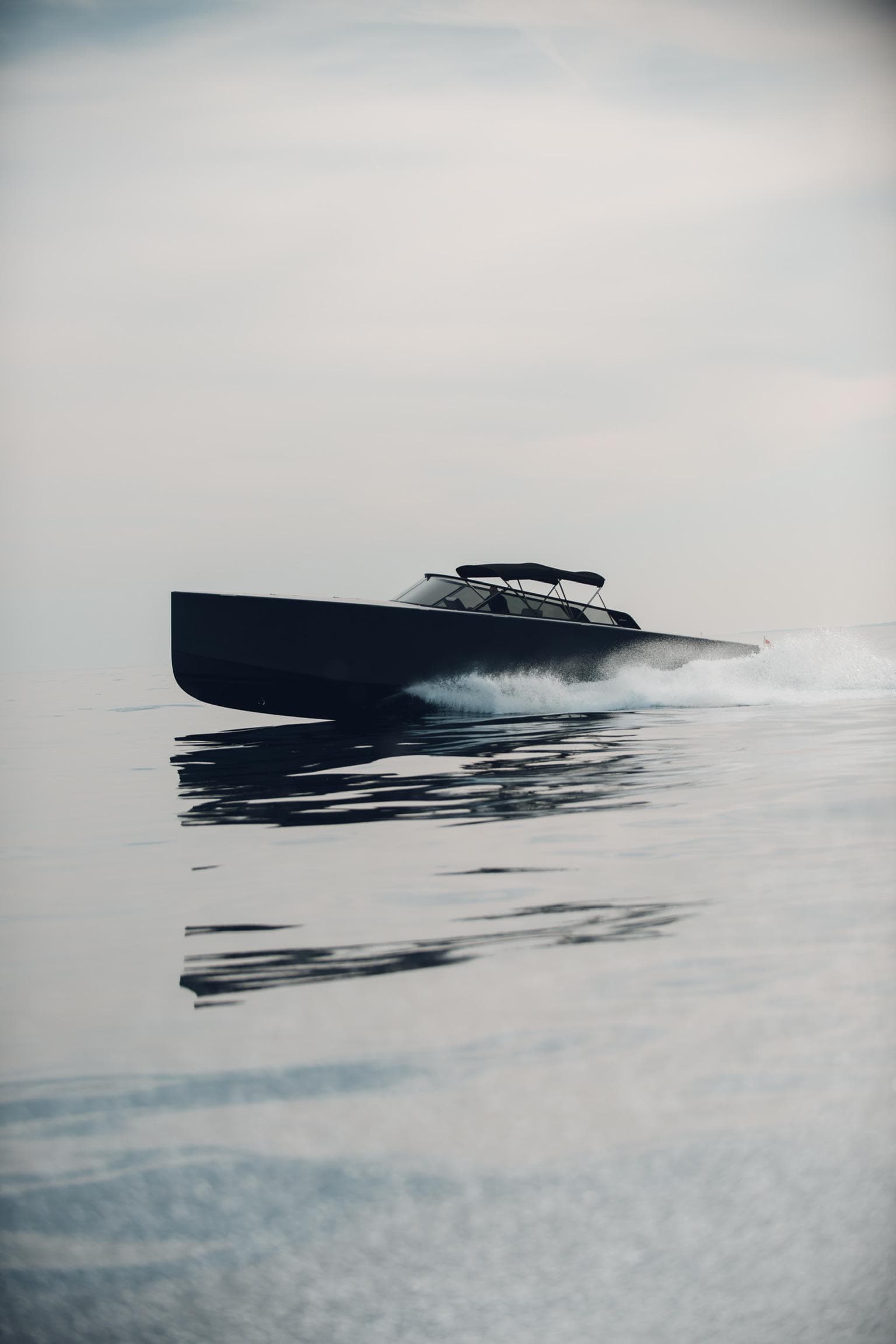 2022 VanDutch 48s yacht cruising on calm waters.