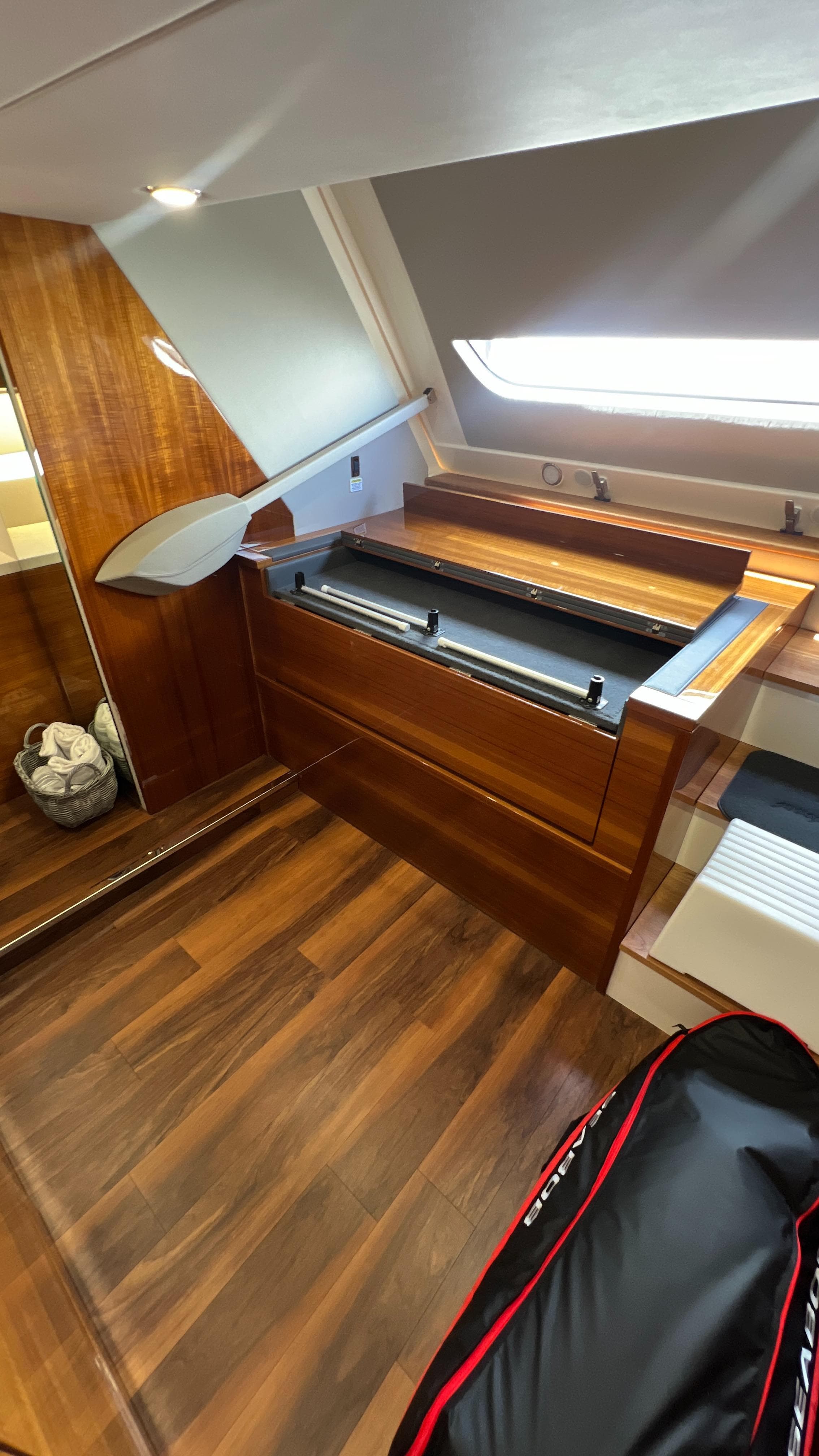 2021 Maritimo X60 yacht interior with wooden flooring and modern design.