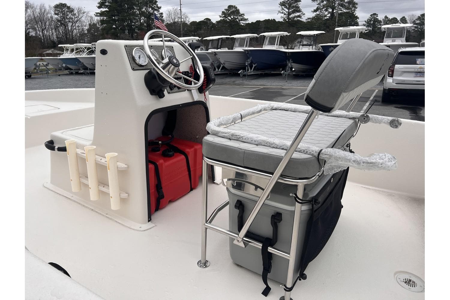 2024 Carolina Skiff EV180 boat interior with console, seating, and storage.