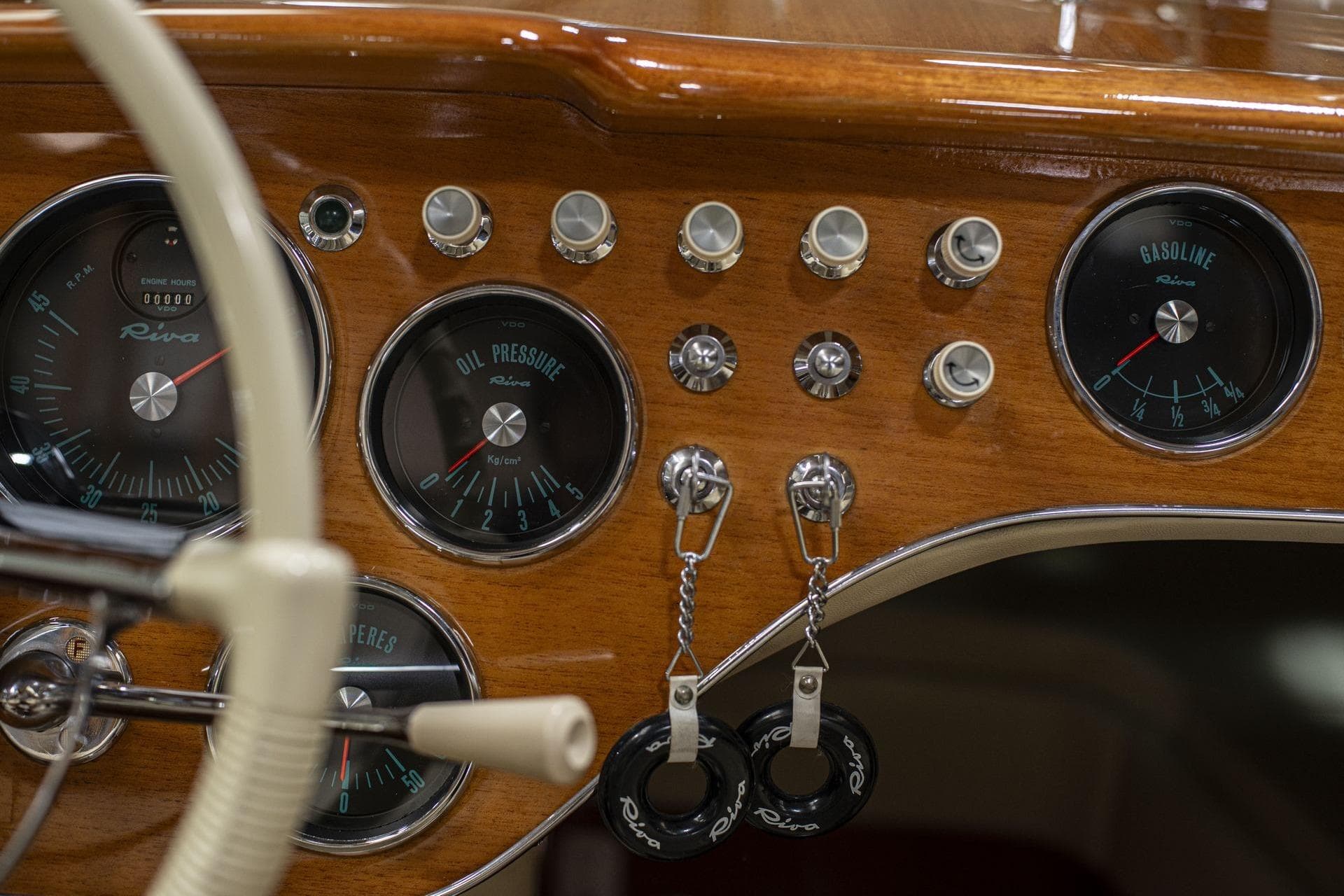 Dashboard of a 1971 Riva Super Aquarama with vintage gauges and controls.