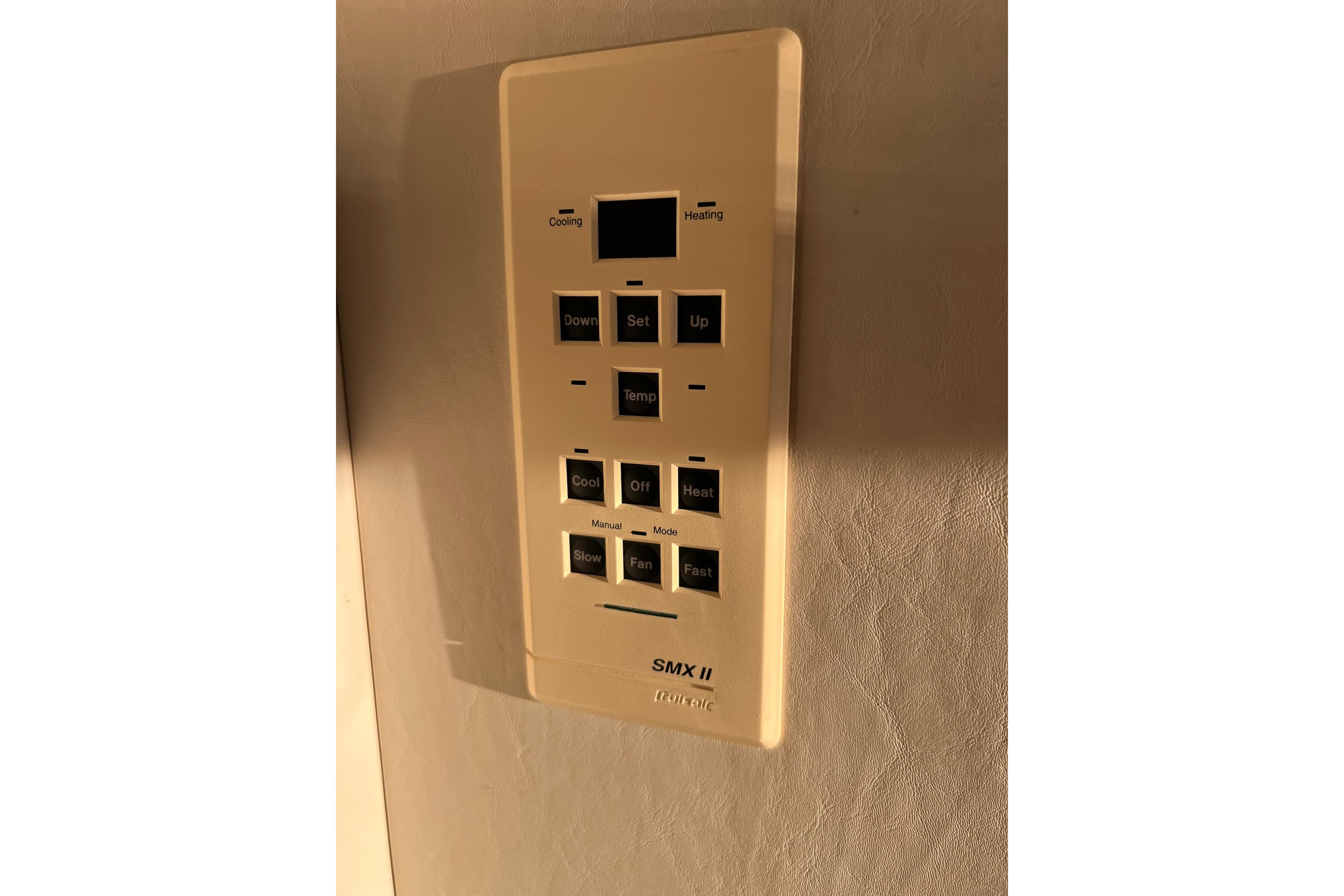 Thermostat control panel on 1997 Sea Ray 370 Aft Cabin yacht.