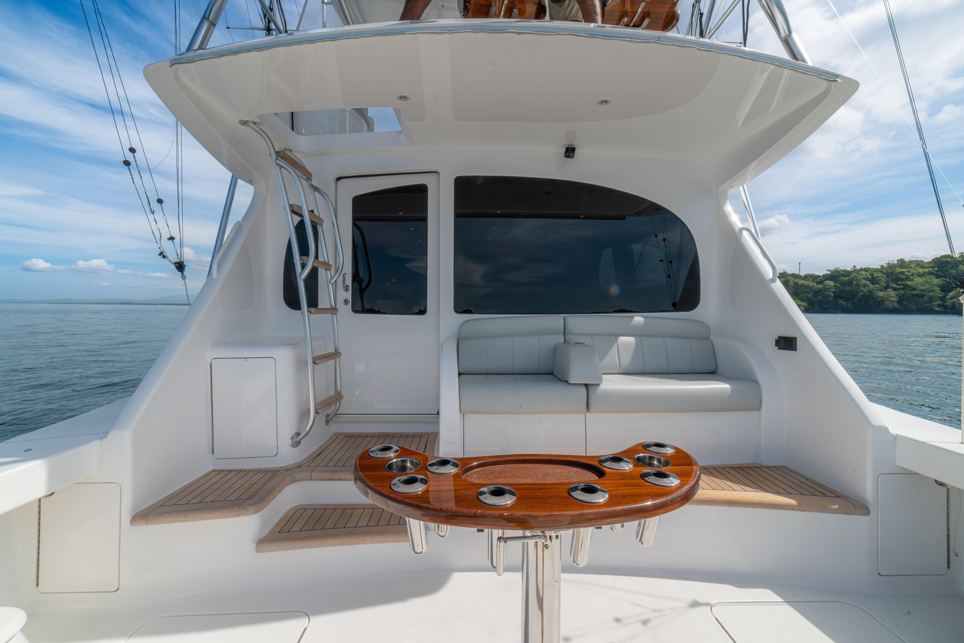 2024 Viking 48 Convertible yacht cockpit with seating and fishing rod holders.